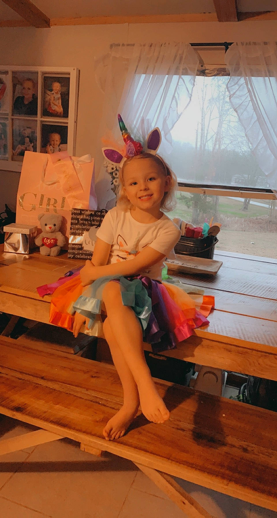 Journey joined the competition — help win amazing prizes! barefoot, bench, child, dress, event, fashion_design, flooring, foot, fun, happy, hardwood, human_body, human_leg, joy, leg, person, picture_frame, sandal, smile, table