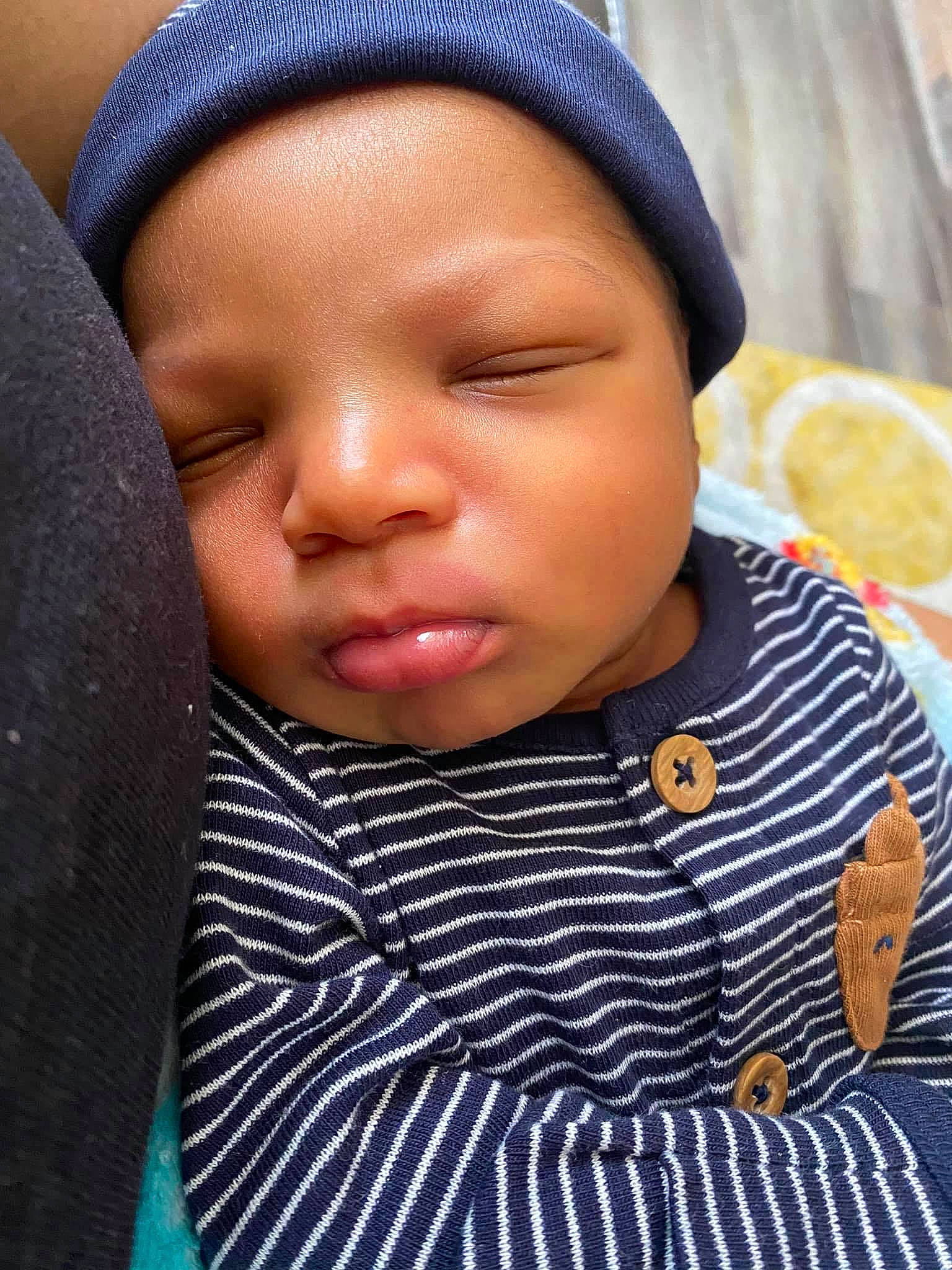 Josiah is registered to the contest to win money with this photo: baby, baby_toddler_clothing, cap, cheek, child, citrus, eyelash, finger, fruit, happy, headwear, human, knit_cap, lemon, lip, meyer_lemon, nose, persian_lime, person, skin