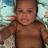 Namir joined the competition — help win amazing prizes! baby, infant, diaper, blanket, cushion, pattern, skin, face, tongue, expression, lying_down, child, cute, portrait, indoors, human, newborn, baby_boy, comfort, soft