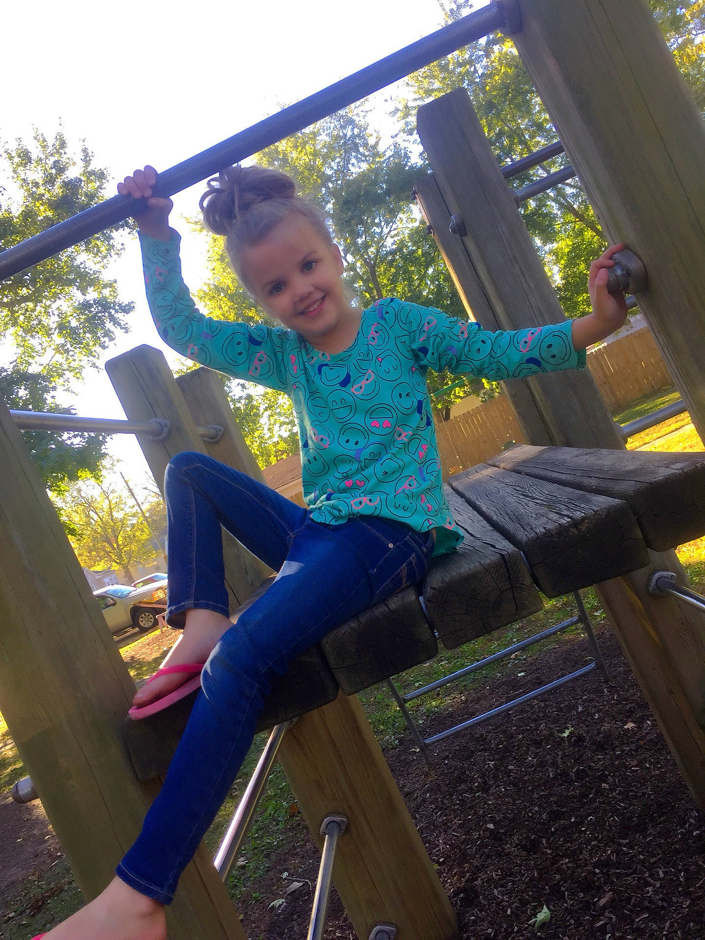 Emma Nevaeh is registered to the contest to win money with this photo: child, fun, jeans, joy, leaf, leisure, person, photography, plant, playground, recreation, smile, style, t_shirt, textile, top, tree, vacation
