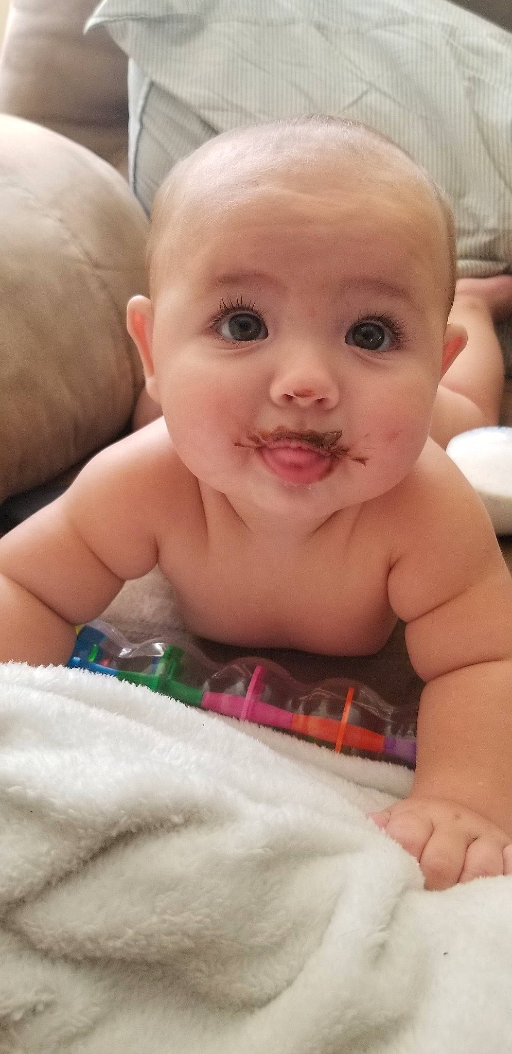 Dannie joined the competition — help win amazing prizes! baby, baby_making_funny_faces, cheek, child, ear, eye, eyebrow, face, forehead, hand, head, iris, lip, mouth, nose, person, skin, smile, toddler, tummy_time