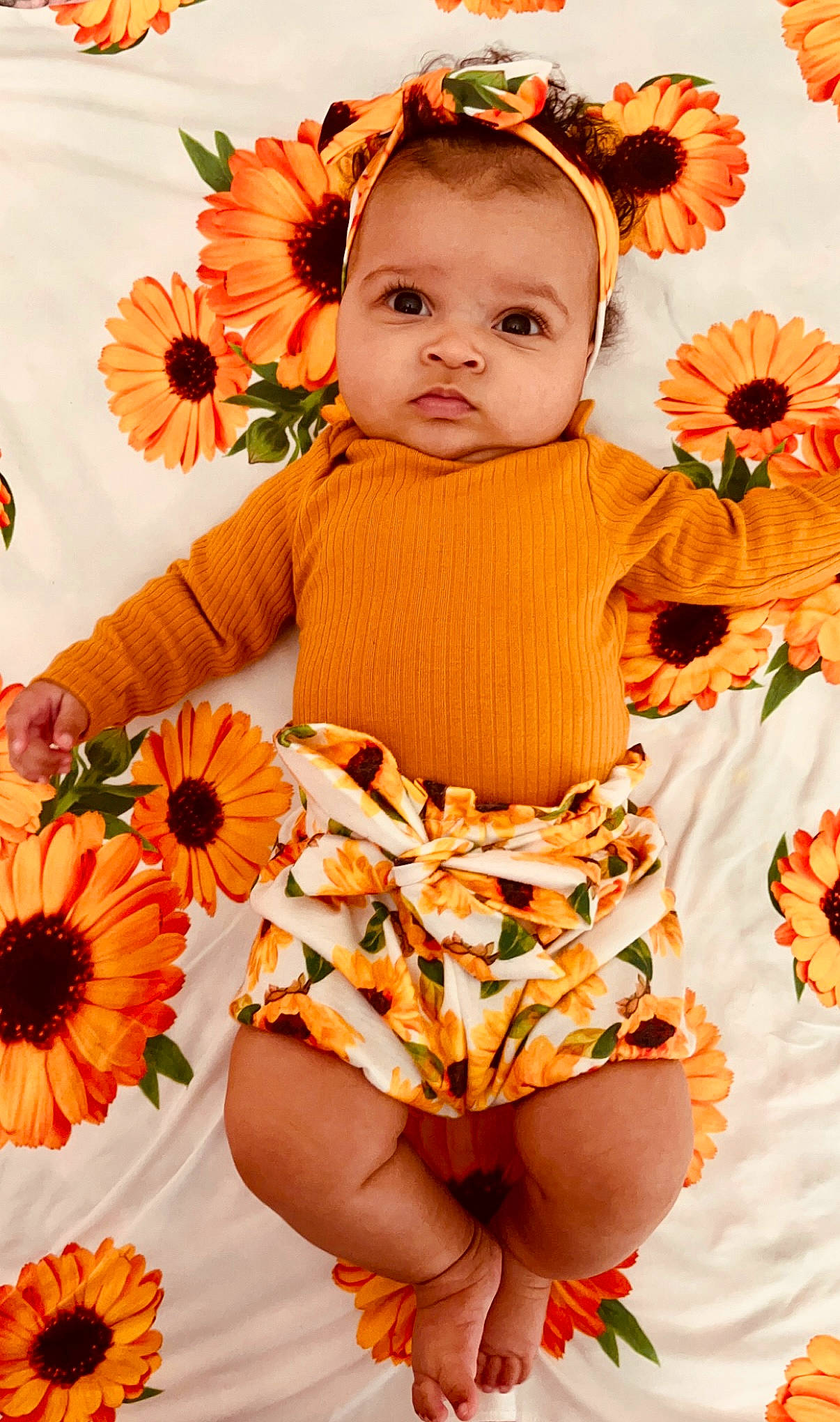 Marianna joined the competition — help win amazing prizes! baby, baby_toddler_clothing, dress, eye, face, facial_expression, finger, flower, happy, orange, people_in_nature, person, petal, pink, plant, skin, sleeve, summer, t_shirt, toddler
