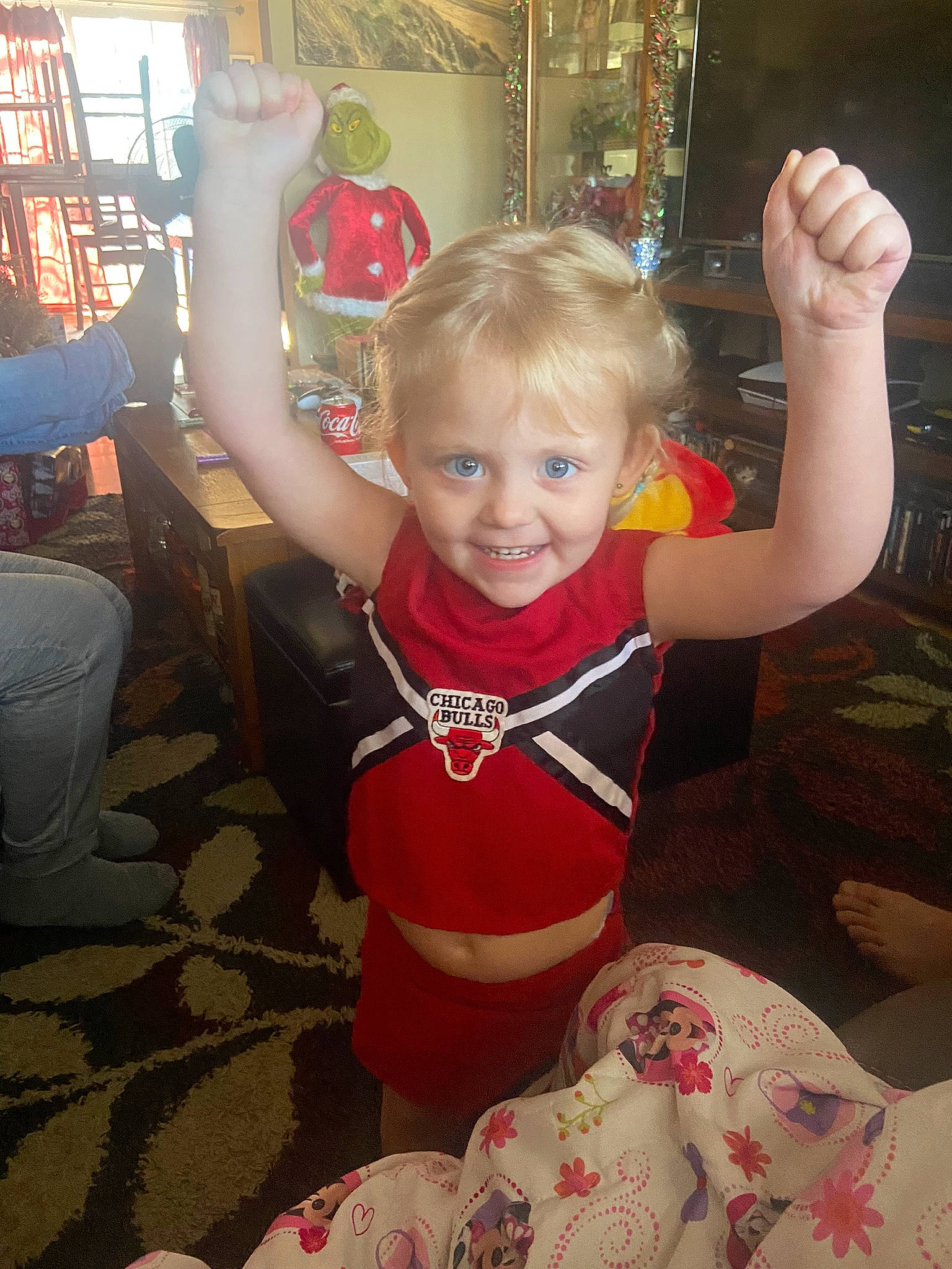 Amelia is registered to the contest to win money with this photo: chair, child, finger, fun, happy, head, human_body, human_leg, joint, joy, knee, lap, leg, muscle, person, sleeve, smile, t_shirt, thigh, thumb