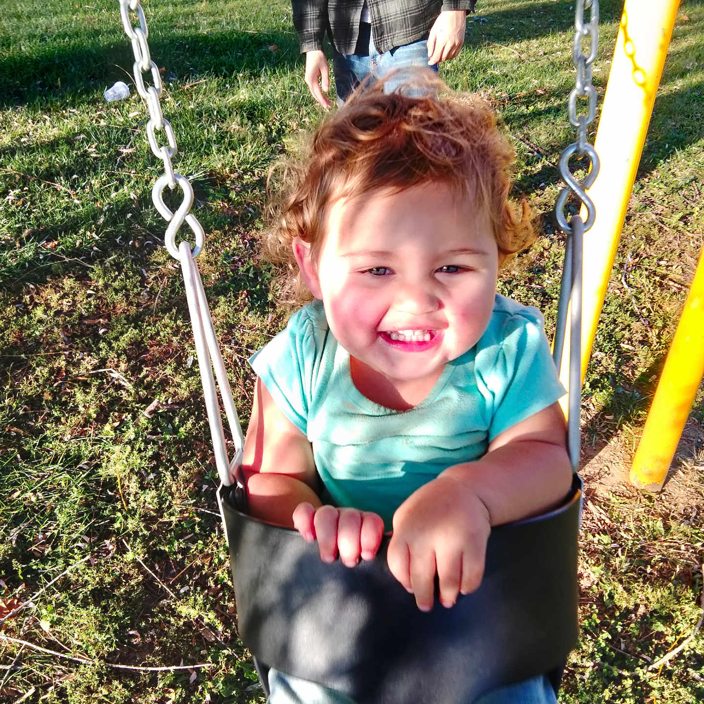 Remi joined the competition — help win amazing prizes! adult, baby, clothing, face, grass, head, jeans, male, man, nature, outdoorplayarea, outdoors, pants, park, person, photography, plant, playarea, portrait, toy