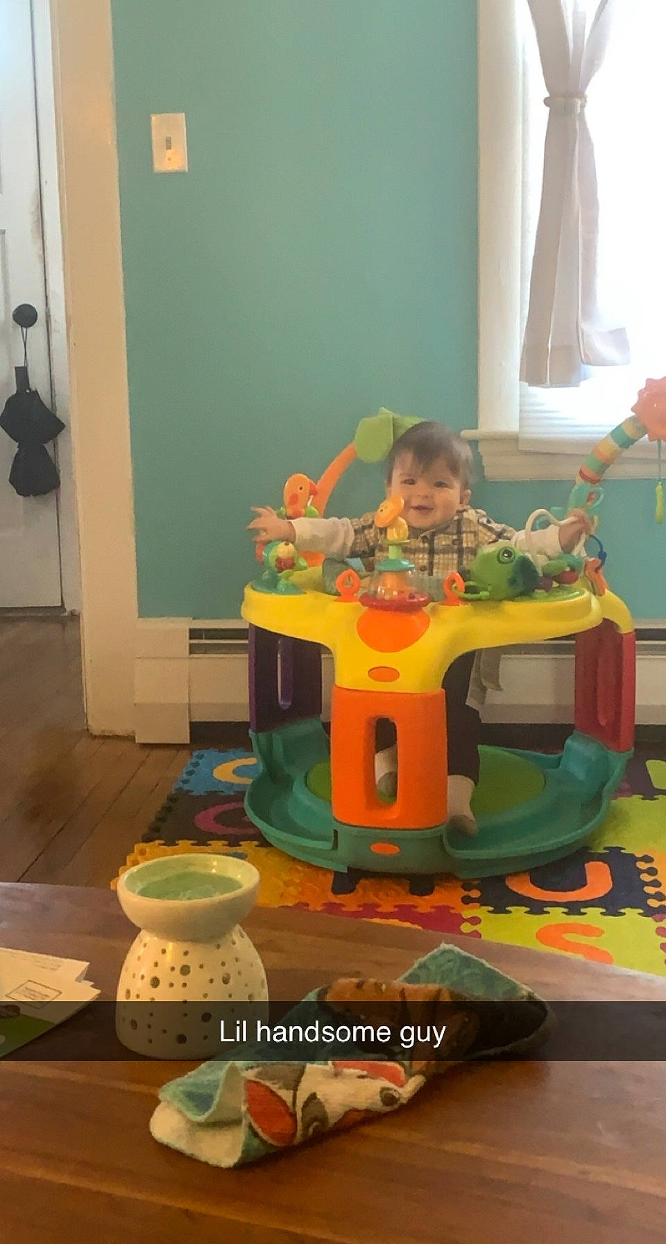 Sheamus joined the competition — help win amazing prizes! baby, baby_playing_with_toys, baby_products, baby_toys, child, curtain, flooring, fun, icing, machine, orange, person, plastic, play, riding_toy, room, sitting, toddler, toy, toy_vehicle