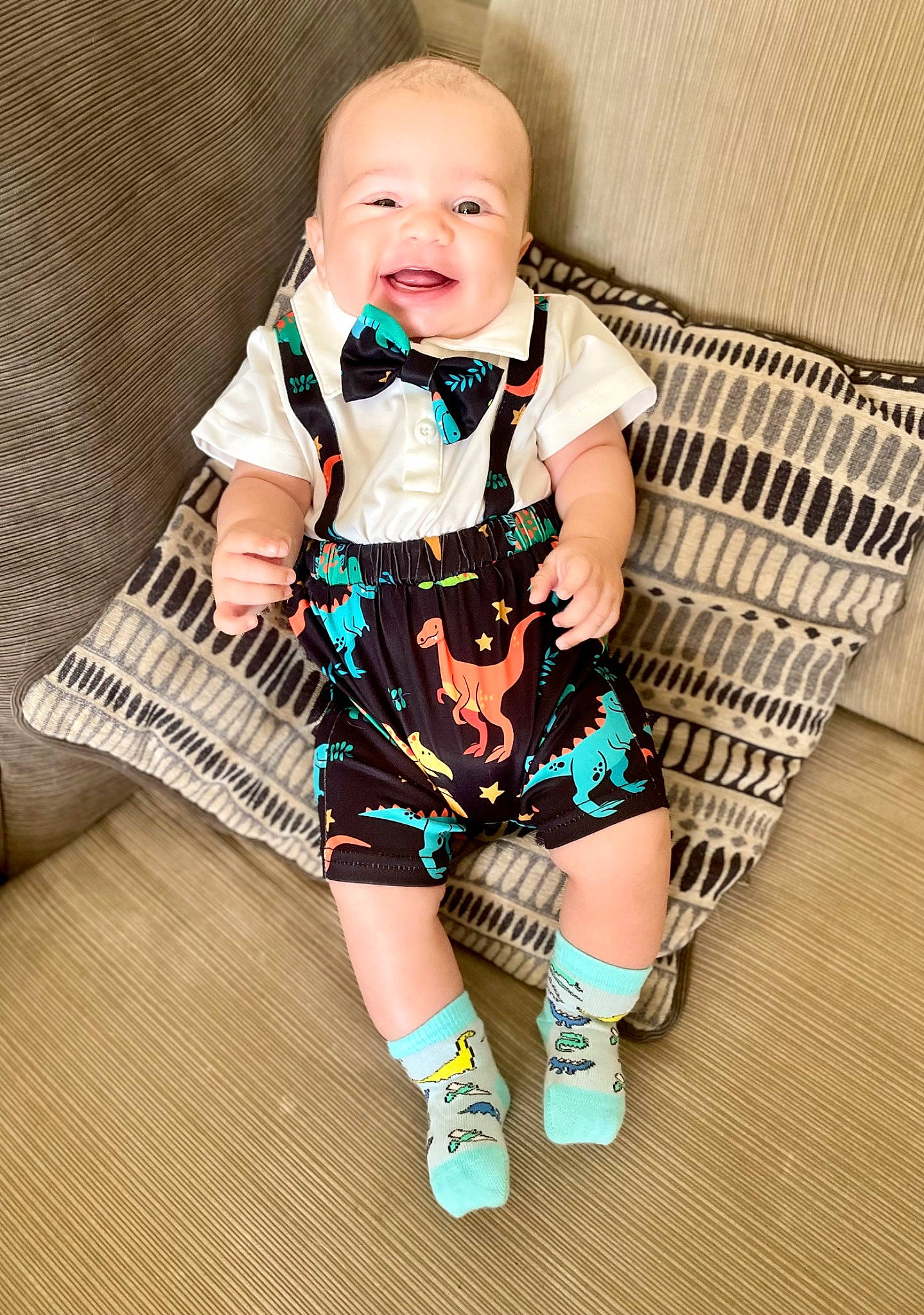 Jamari joined the competition — help win amazing prizes! arm, baby, baby_toddler_clothing, chair, child, collar, comfort, face, fashion_accessory, happy, human_body, human_leg, knee, pattern, person, sitting, sleeve, smile, sock, thigh