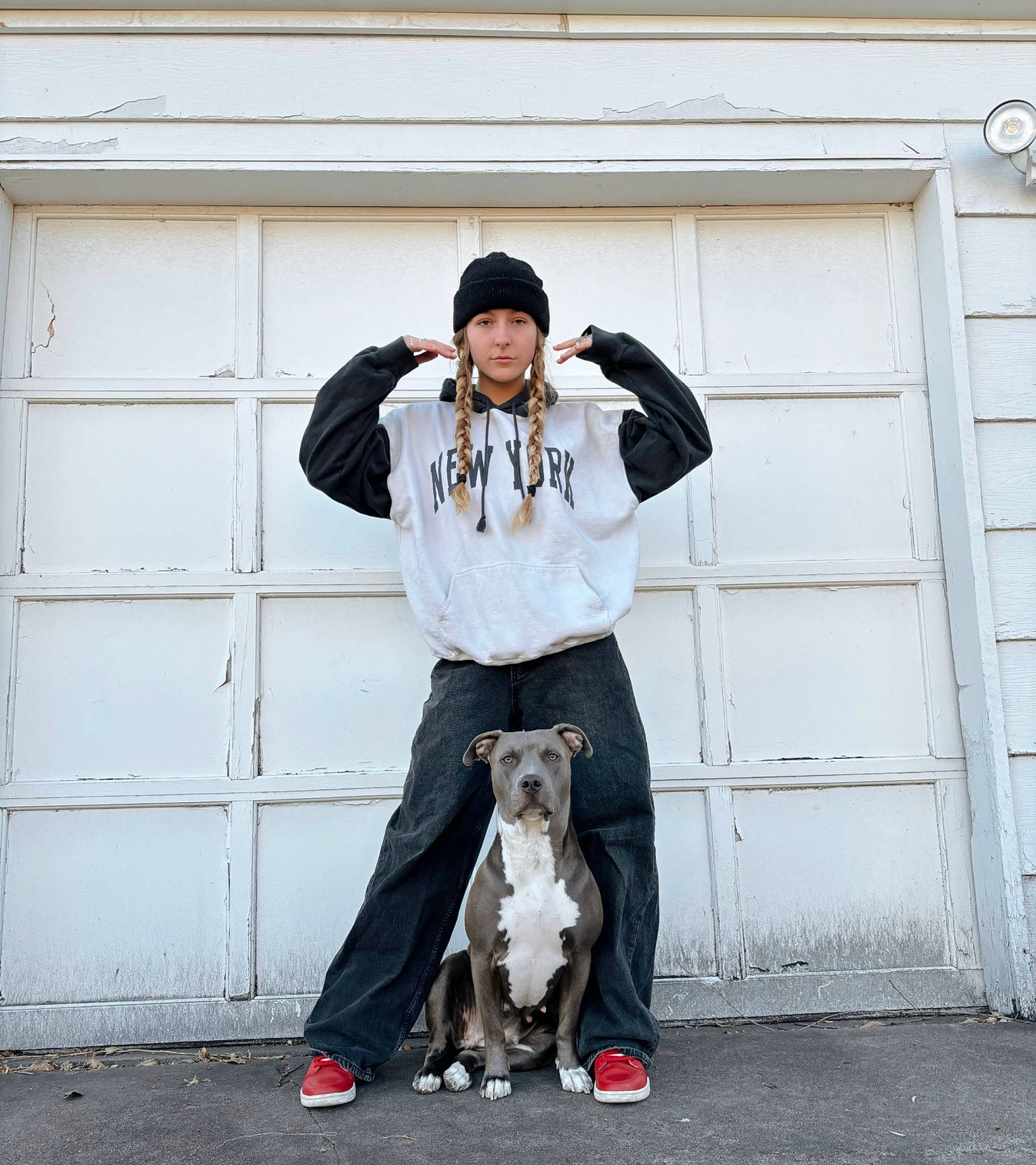 Nylah joined the competition — help win amazing prizes! asphalt, carnivore, companion_dog, denim, dog, dog_breed, eyewear, fashion_accessory, fur, grey, hat, leash, road, shoe, sitting, sleeve, sneakers, snout, street, winter