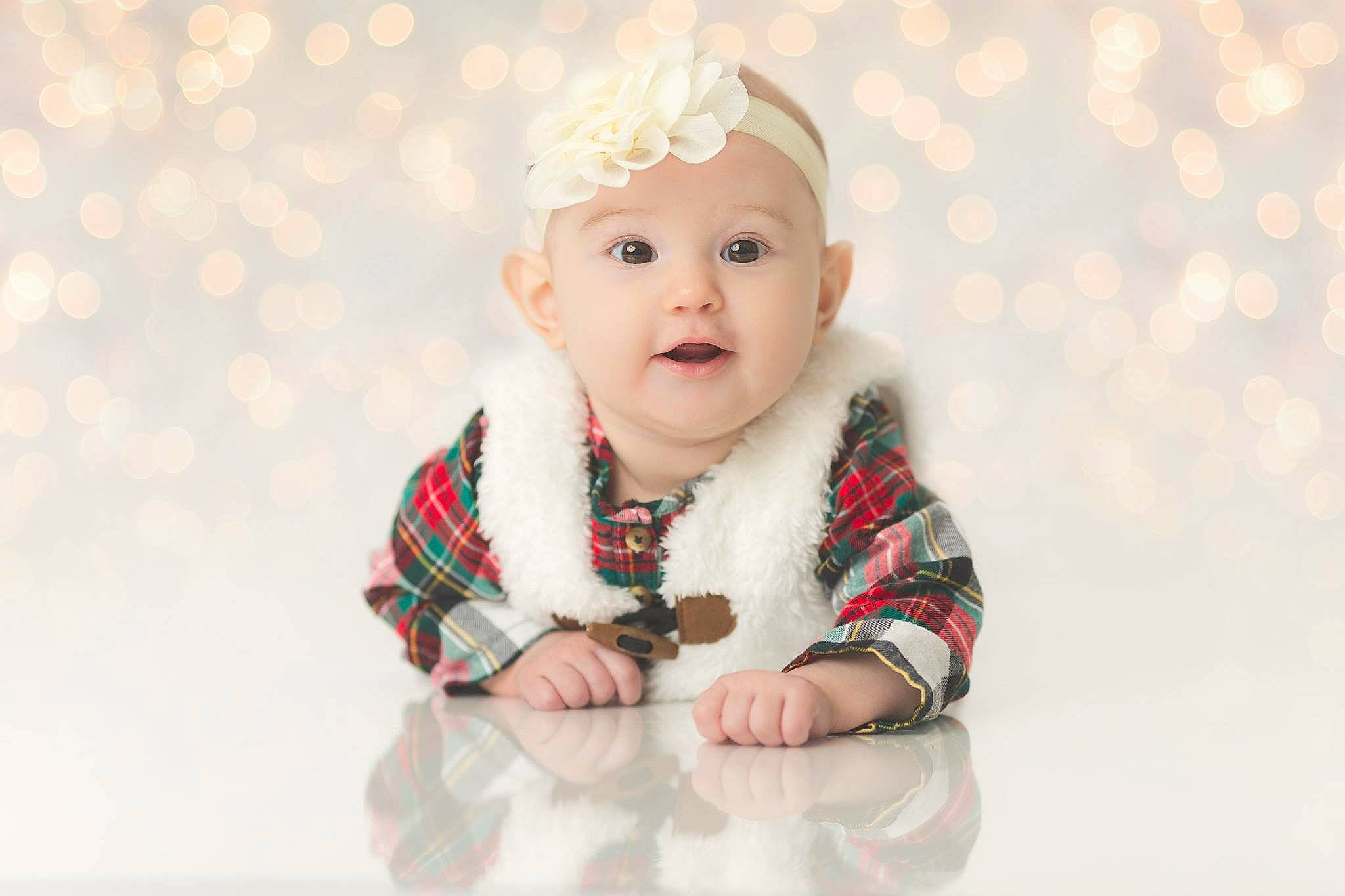 Addison joined the competition — help win amazing prizes! baby, baby_laughing, cheek, child, child_model, face, happy, head, headgear, person, photograph, photography, portrait, portrait_photography, sitting, skin, sleeve, smile, toddler, white