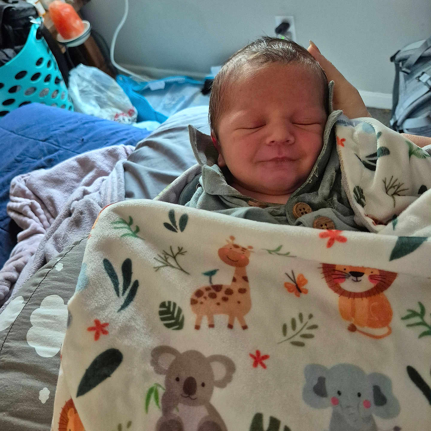 Colter is registered to the contest to win money with this photo: accessories, architecture, baby, bag, bed, blanket, building, crib, cushion, face, furniture, handbag, head, homedecor, hospital, infantbed, newborn, person, photography, portrait