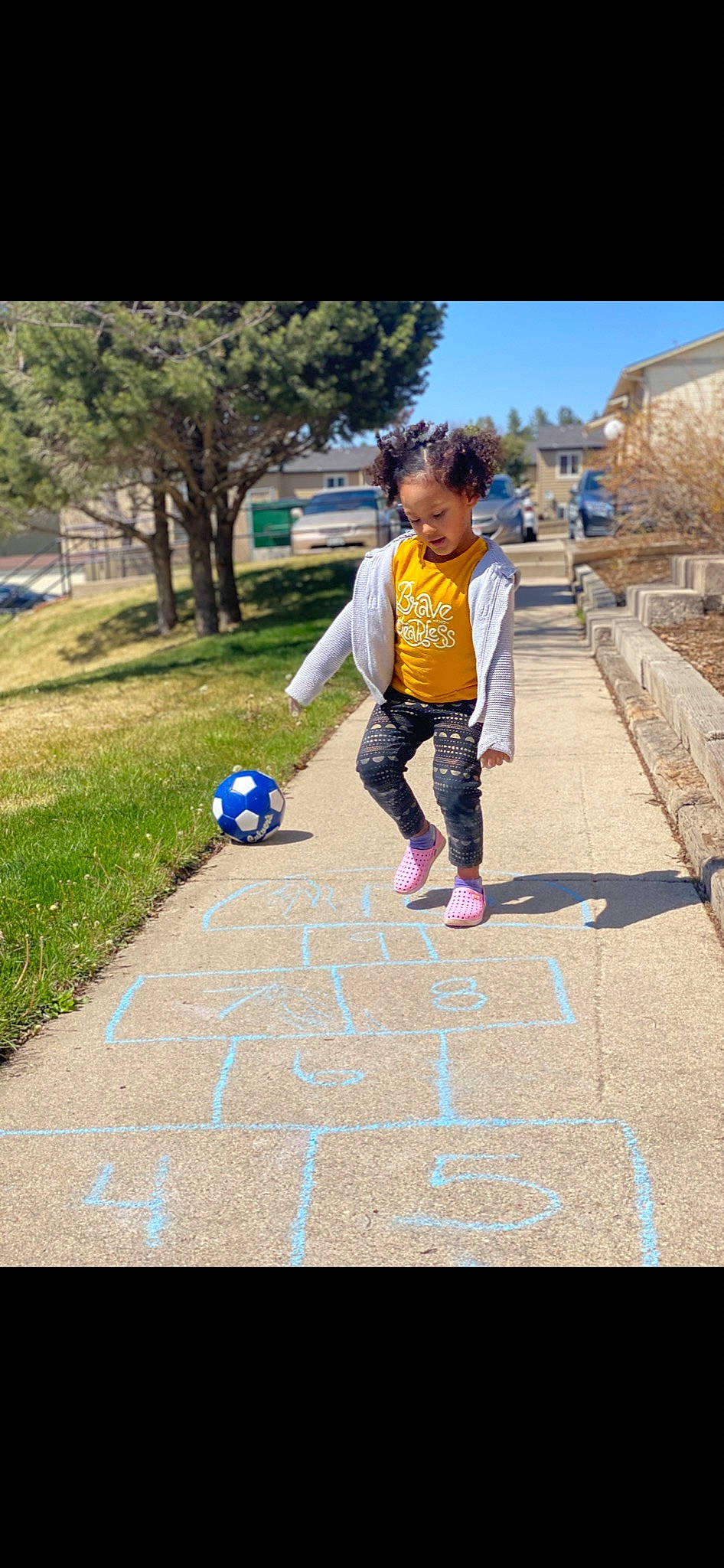 Adalina joined the competition — help win amazing prizes! asphalt, ball, football, fun, grass, leisure, person, plant, player, recreation, shorts, sky, sneakers, soccer, soccer_ball, sports, sports_equipment, sports_toy, t_shirt, toddler