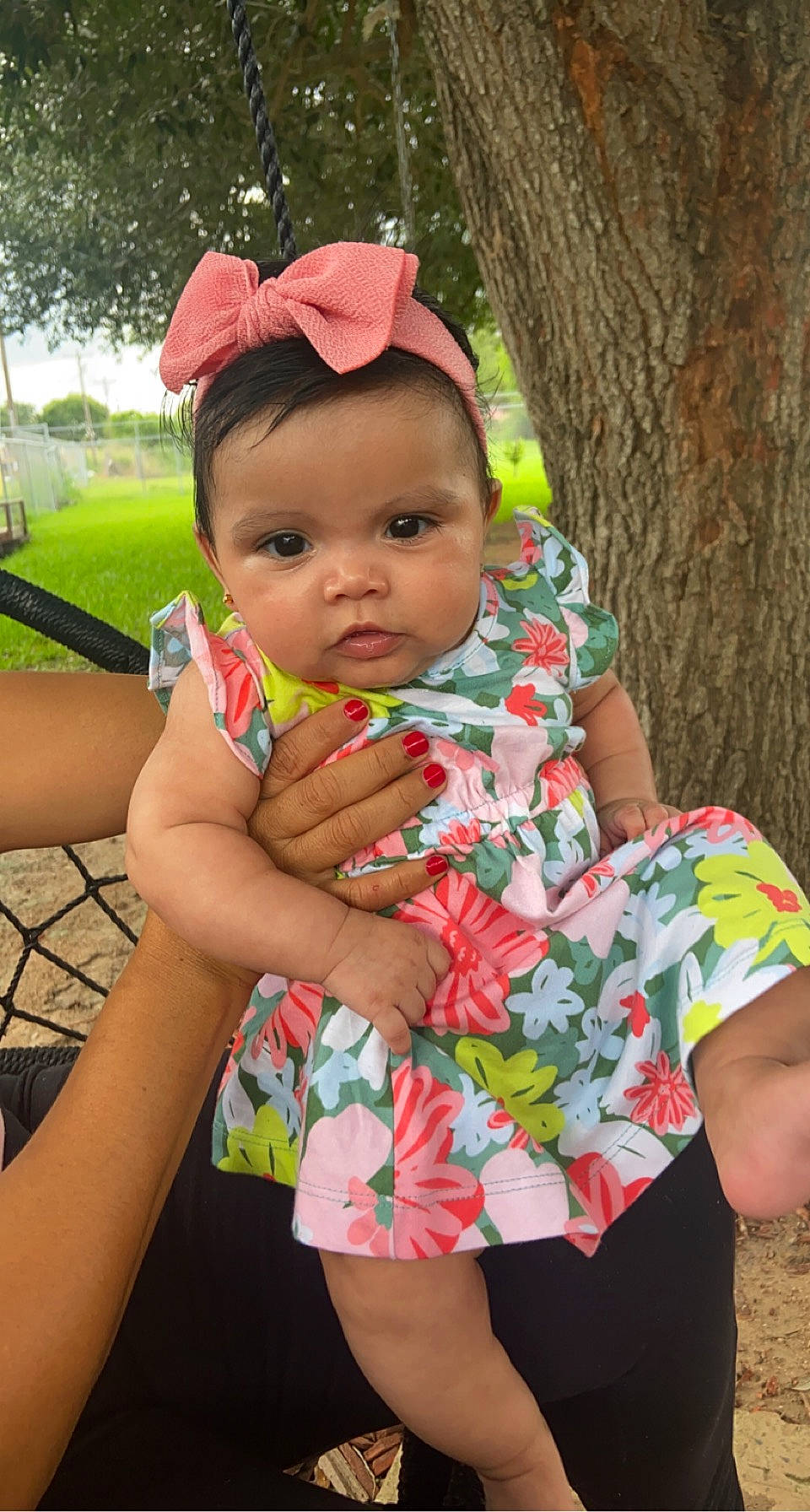 Addelyn is registered to the contest to win money with this photo: arm, baby, baby_toddler_clothing, botany, cap, child, face, finger, grass, happy, headwear, leaf, leisure, lip, people_in_nature, person, pink, plant, skin, summer