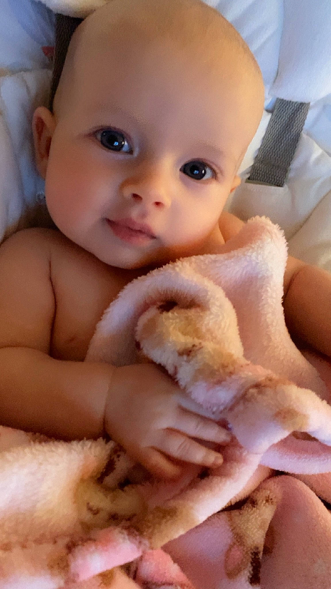 Madilyn is registered to the contest to win money with this photo: arm, baby, baby_toddler_clothing, cheek, chest, chin, eyelash, finger, gesture, hand, iris, lip, mammal, mouth, nail, neck, nose, person, skin, thumb