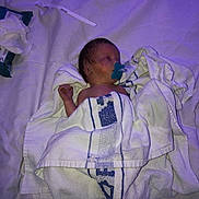 Theodore joined the competition — help win amazing prizes! newborn, baby, pacifier, towel, bed, sleeping, infant, blue, white, blanket, phone, tissue, resting, indoors, human, child, cute, small, wrapped, peaceful