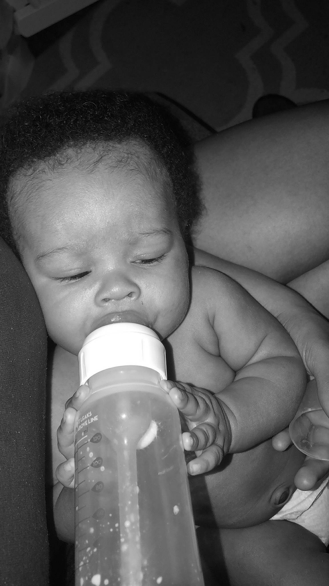 Ezikai joined the competition — help win amazing prizes! baby, baby_bottle, baby_products, black_and_white, bottle, child, drinking, drinkware, eye, face, hand, infant_formula, mouth, nose, person, plastic_bottle, product, skin, tableware, toddler