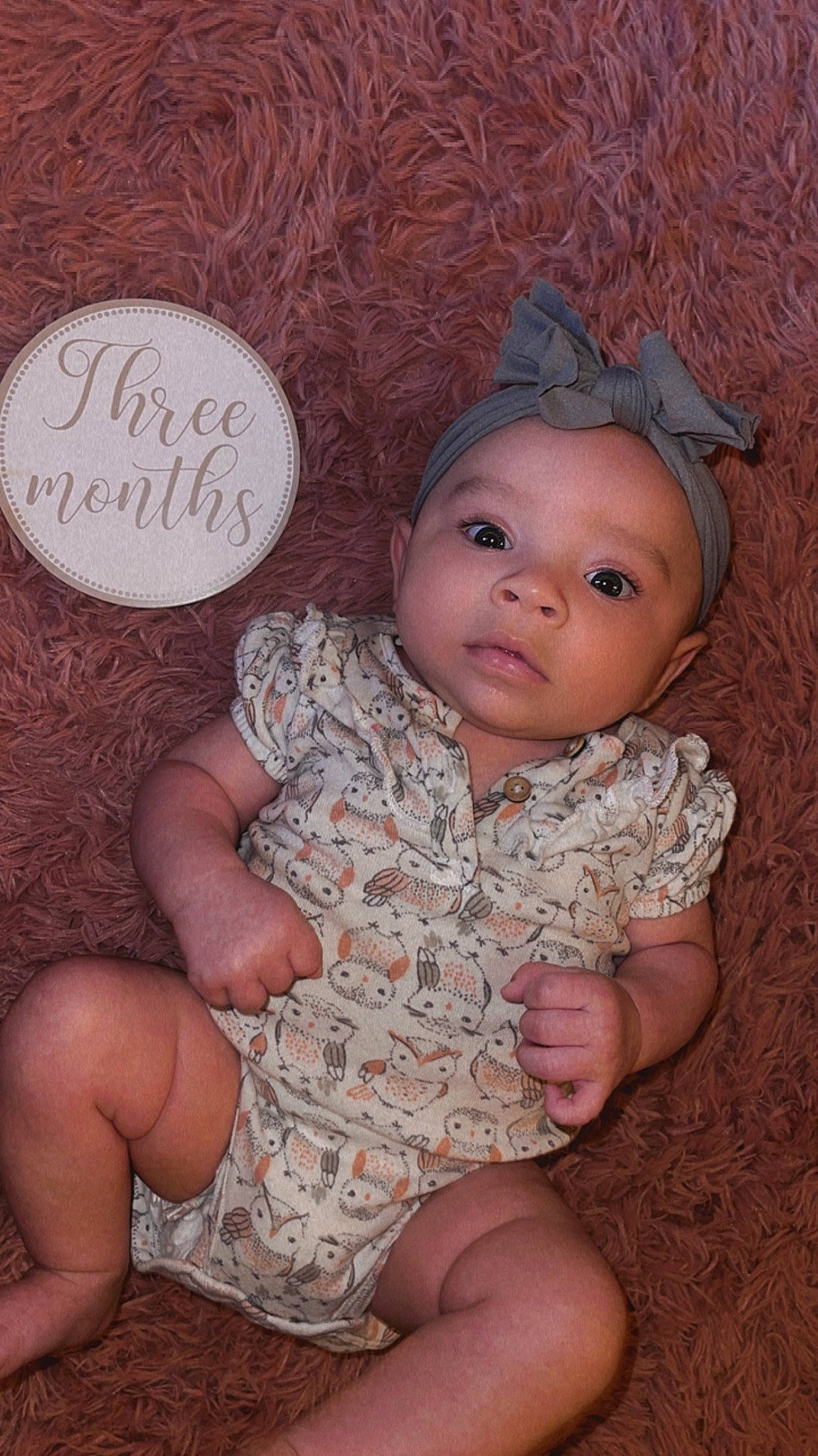 Alani joined the competition — help win amazing prizes! baby, baby_toddler_clothing, cap, cheek, child, chin, facial_expression, gesture, hairstyle, hand, happy, iris, nose, person, pink, skin, sleeve, textile, thigh, thumb