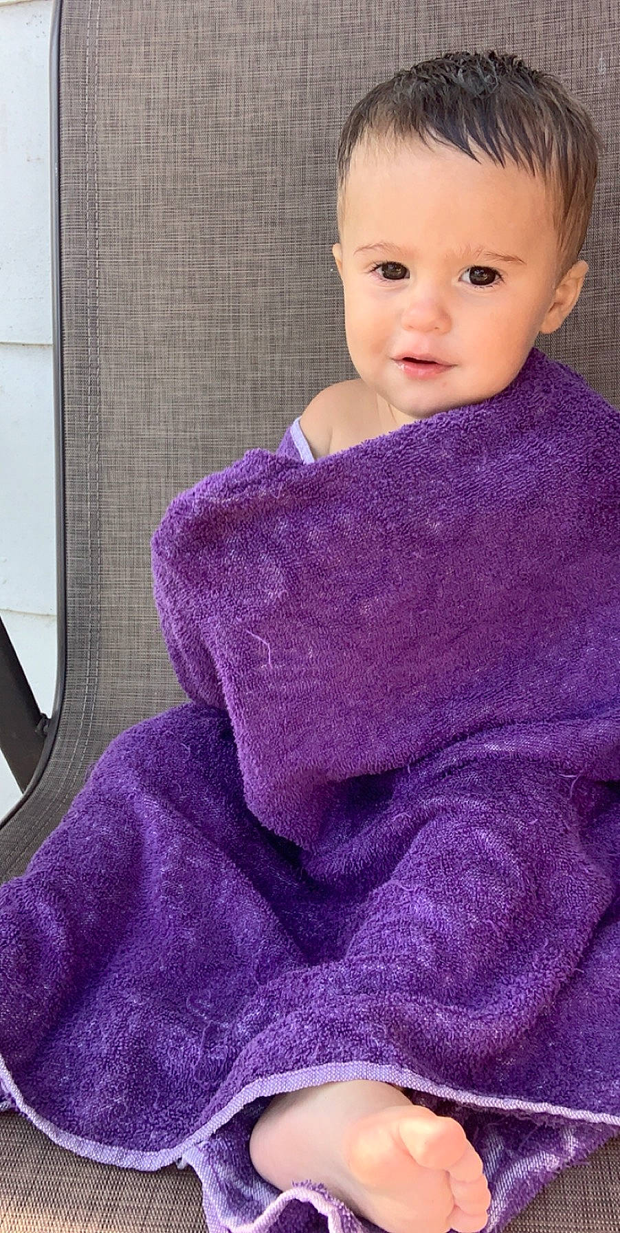 Alessio is registered to the contest to win money with this photo: baby, blanket, child, clothing, knitting, lavender, lilac, linens, magenta, neck, outerwear, pattern, person, purple, robe, sleeve, textile, toddler, towel, violet