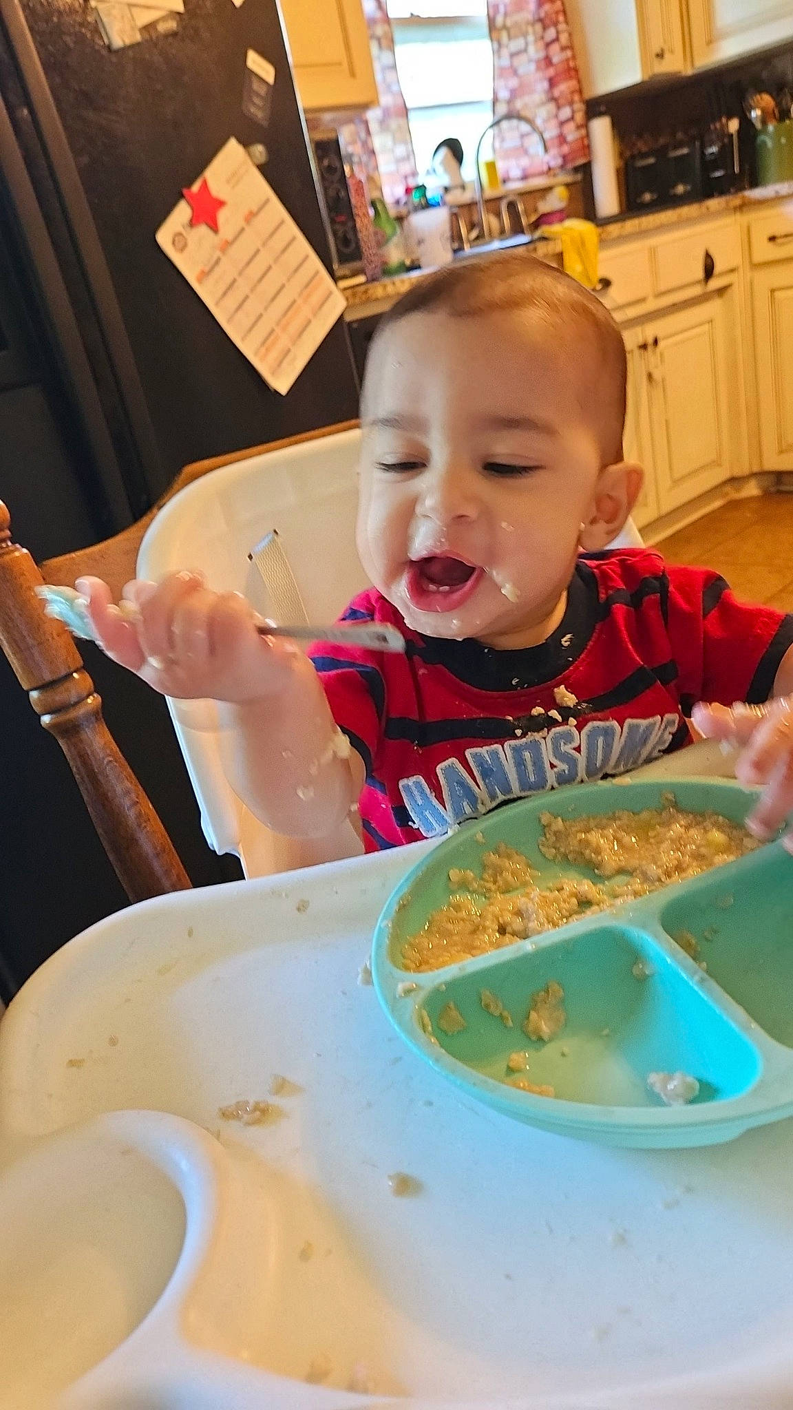 Bradley joined the competition — help win amazing prizes! baby, cabinetry, chair, child, cooking, cuisine, cutlery, dish, dishware, food, food_craving, ingredient, kitchen_utensil, person, plate, smile, spoon, t_shirt, table, tableware