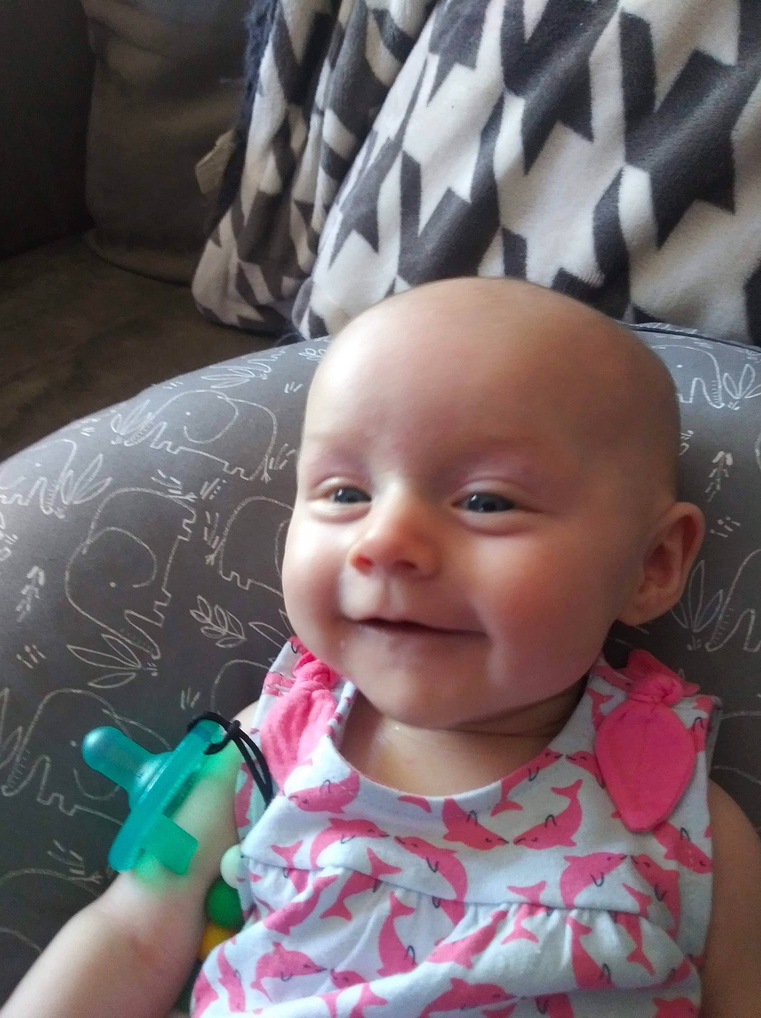 Adaline is registered to the contest to win money with this photo: baby, baby_toddler_clothing, black, cheek, child, chin, comfort, eye, face, happy, iris, lip, mouth, nose, person, pink, skin, smile, textile, toddler