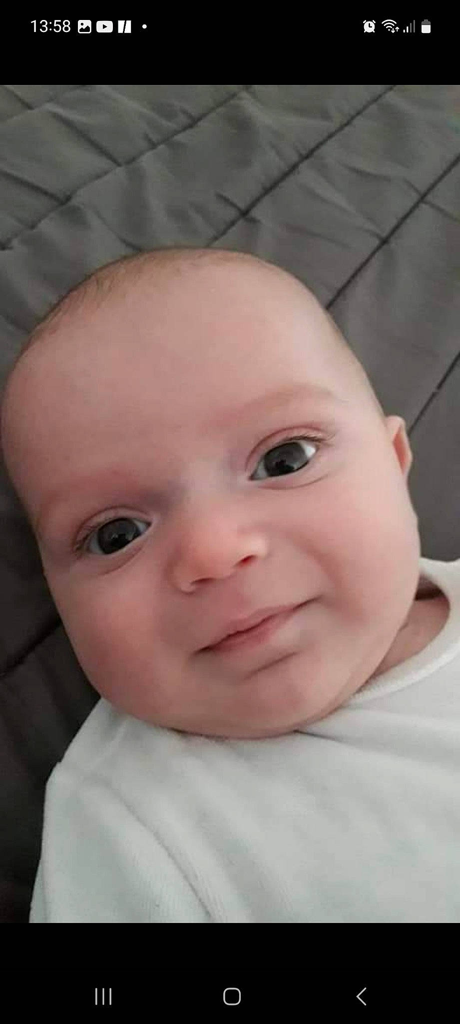 Juanito a rejoint le concours — aidez-le/la à gagner de superbes lots ! baby, baby_toddler_clothing, cheek, child, comfort, ear, eye, eyebrow, eyelash, forehead, happy, iris, joy, lip, mouth, nose, person, skin, sleeve, smile