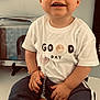 Théo a rejoint le concours — aidez-le/la à gagner de superbes lots ! baby, child, tshirt, pacifier, sneakers, pants, happy, smile, indoor, floor, person, clothing, face, hair, young_child, seated, toy, chain, photograph, background