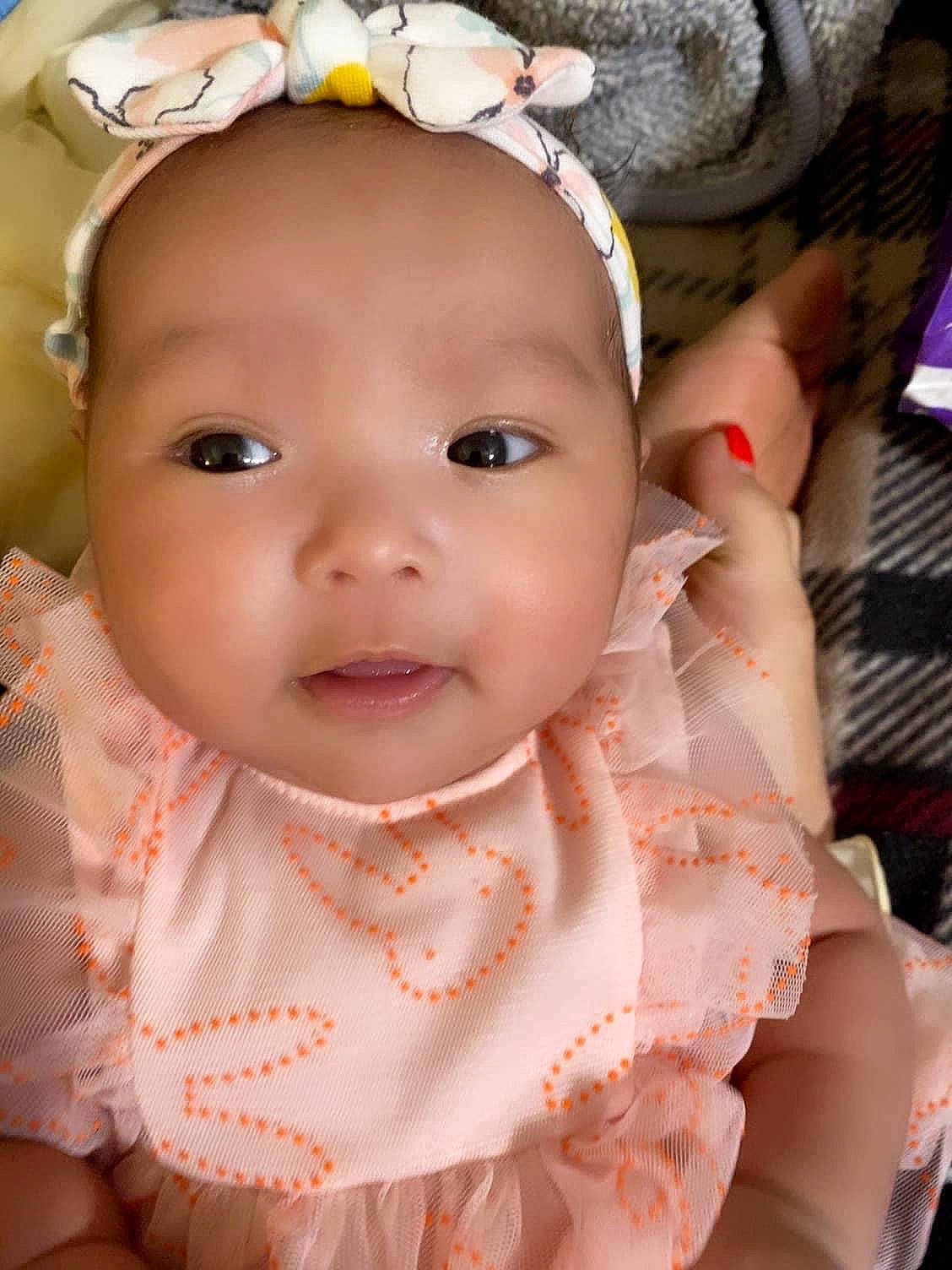 Katie joined the competition — help win amazing prizes! baby, baby_toddler_clothing, cheek, child, chin, clothing, dress, eye, eyelash, facial_expression, happy, headpiece, human_body, iris, jewellery, lip, person, pink, skin, sleeve