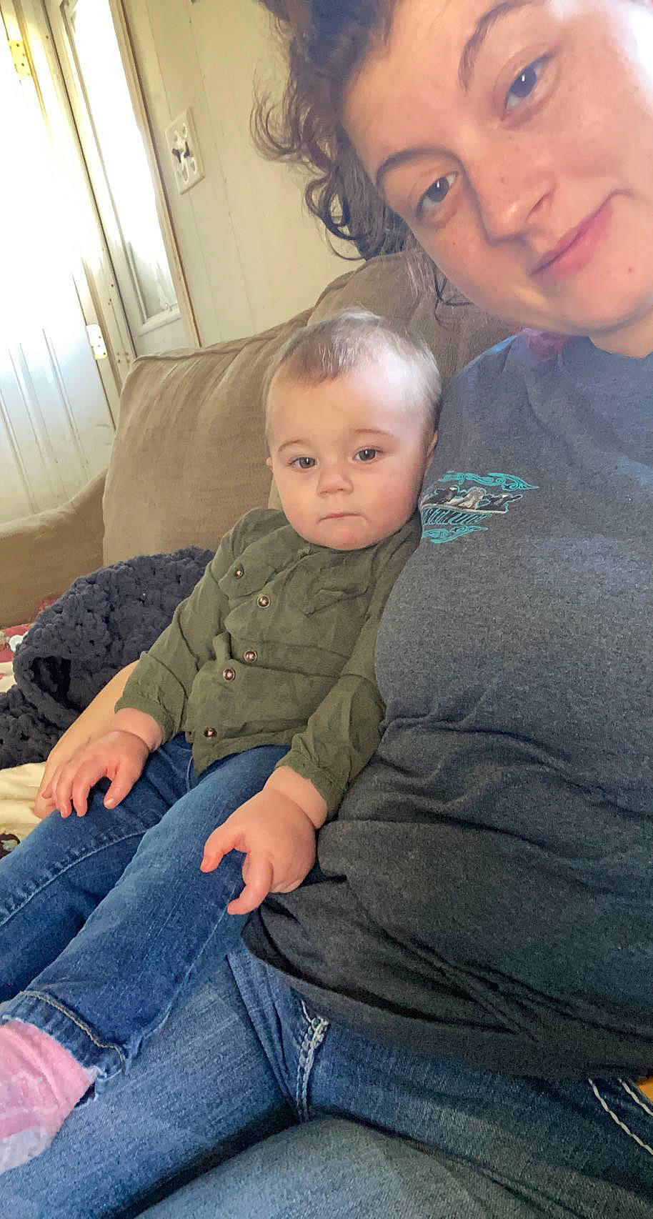 Lucille is registered to the contest to win money with this photo: baby, cheek, child, comfort, denim, fun, happy, iris, joy, lap, nose, person, picture_frame, room, sitting, skin, smile, toddler, vacation, window