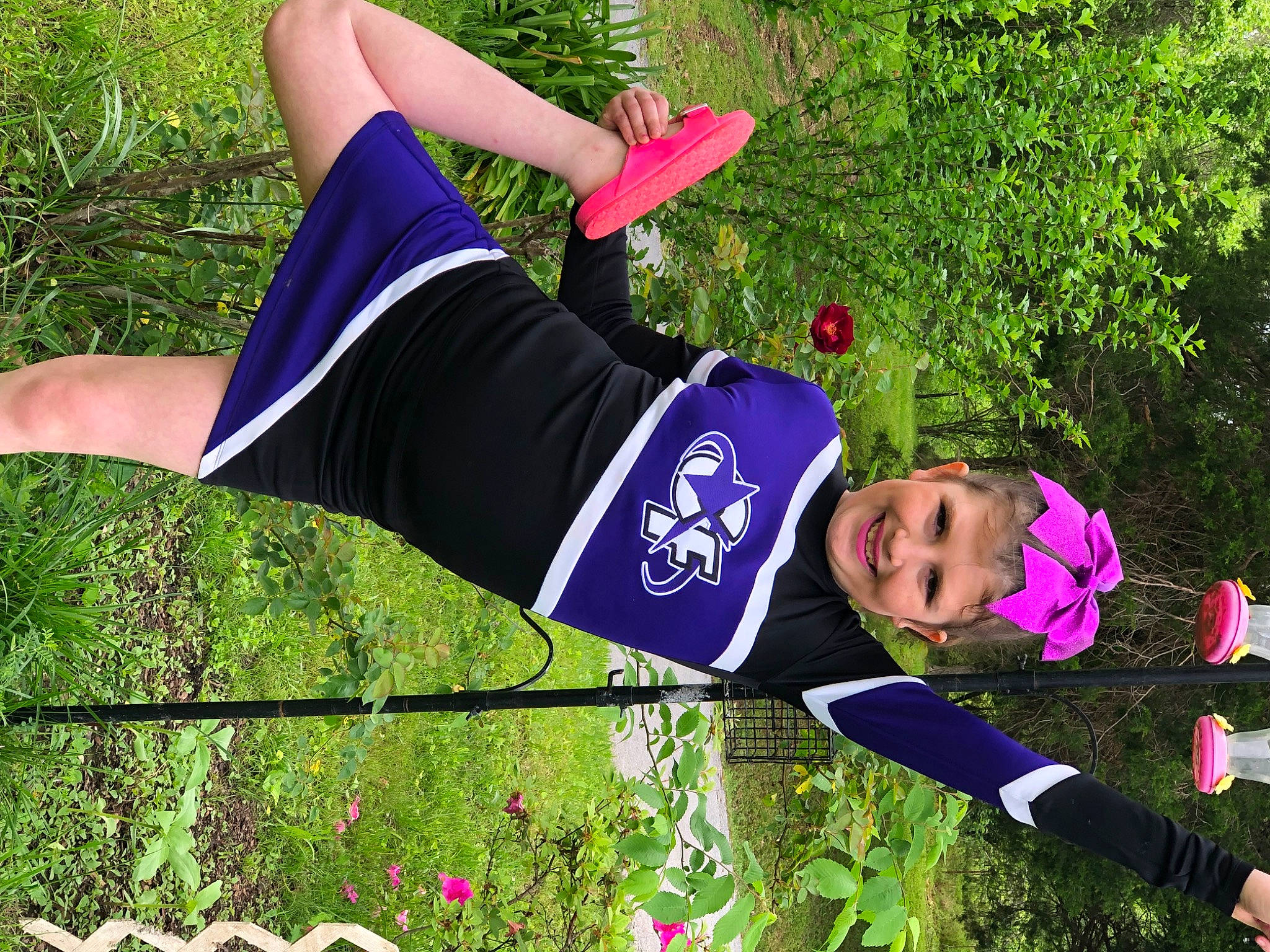 Abbygail joined the competition — help win amazing prizes! active_pants, balance, fun, grass, happy, headwear, human_leg, joy, knee, leisure, magenta, people_in_nature, person, pink, plant, recreation, shorts, smile, sportswear, spring