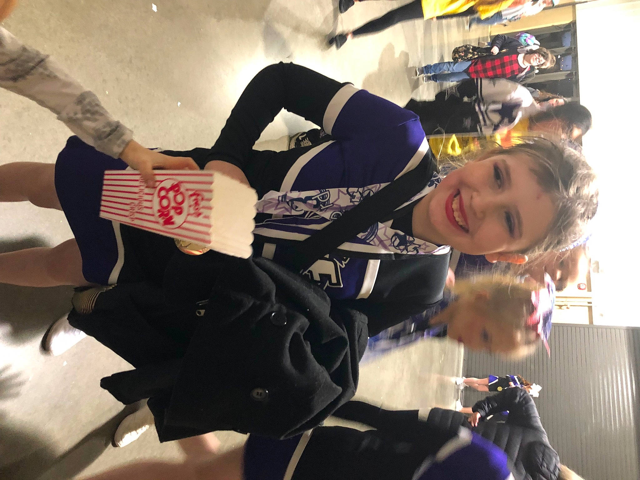 Abbygail is registered to the contest to win money with this photo: cool, costume, elbow, event, fun, gesture, happy, human_leg, joy, knee, person, recreation, room, smile, team, thigh, uniform