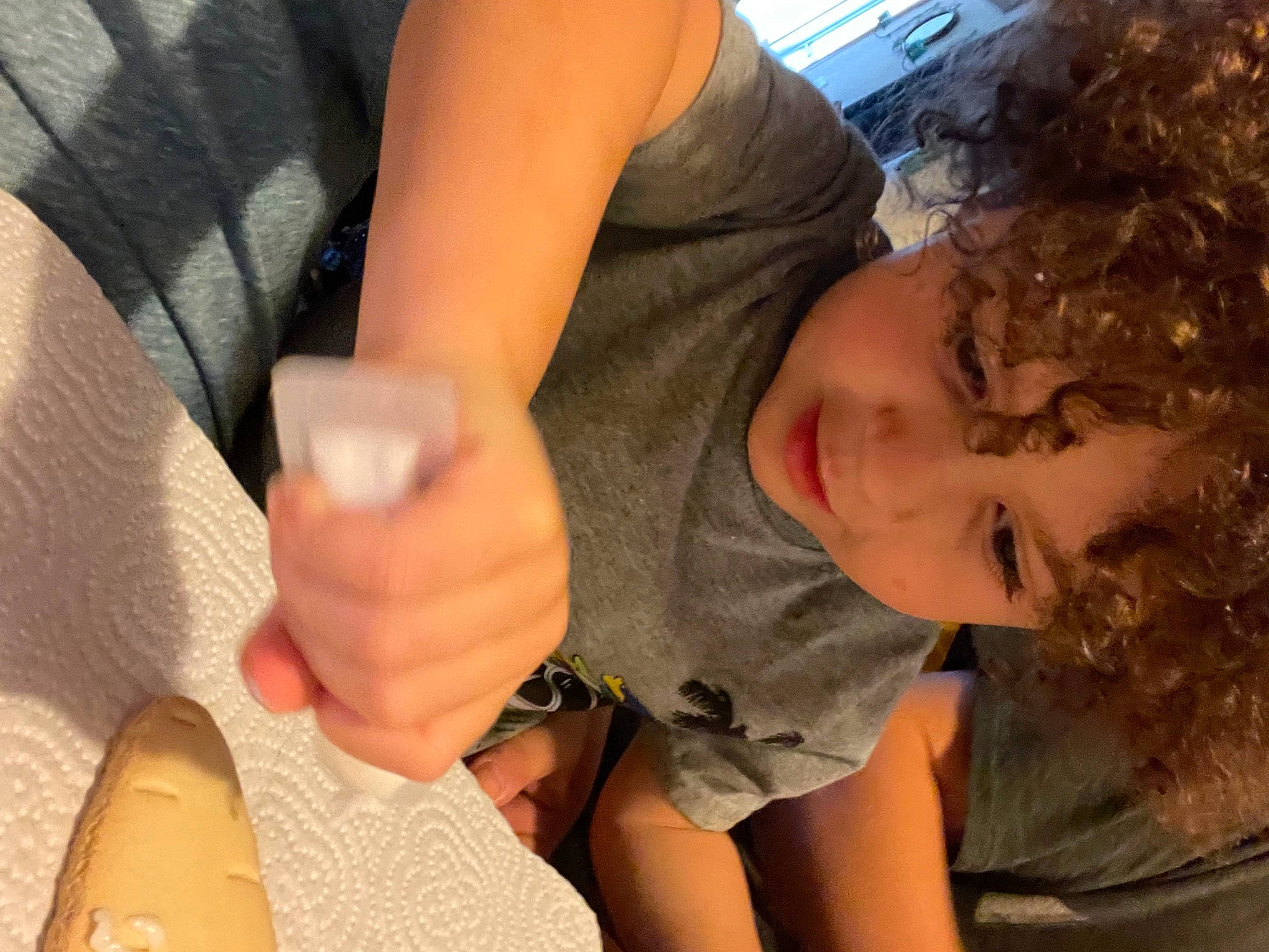 Jax is registered to the contest to win money with this photo: chest, child, comfort, elbow, finger, fun, gesture, human_leg, joint, knee, mouth, nail, neck, person, skin, sleeve, thigh, thumb, toddler, trunk