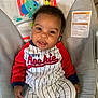 Rashim joined the competition — help win amazing prizes! baby, child, infant, bouncer, clothing, striped_outfit, red_sleeves, drool, face, eyes, cute, indoor, baby_toys, animal_print, monkey, elephant, octopus, seat, fabric, warning_label