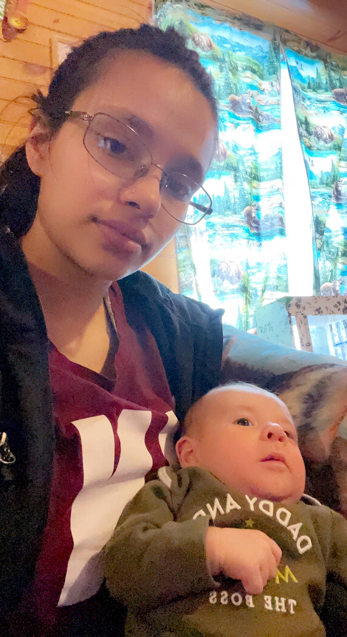 Terry is registered to the contest to win money with this photo: baby, baby_toddler_clothing, cheek, child, curtain, eye, eyelash, eyewear, face, forehead, fun, glasses, happy, iris, lip, nose, person, sitting, skin, toddler