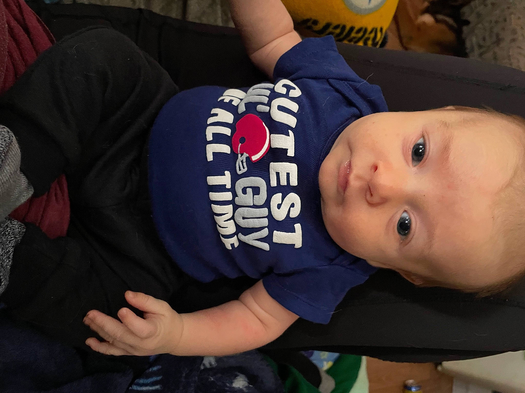 Terry is registered to the contest to win money with this photo: arm, baby, baby_products, baby_safety, baby_toddler_clothing, cheek, child, comfort, elbow, fun, person, plant, room, sitting, sleeve, t_shirt, thigh, toddler