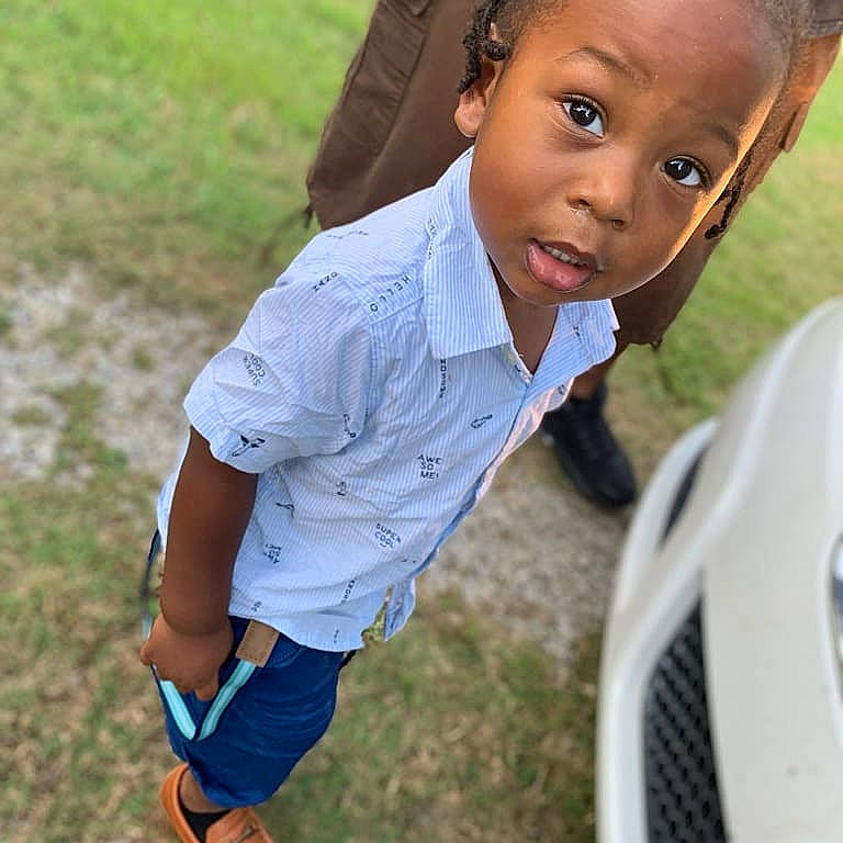 Lj is registered to the contest to win money with this photo: child, child_model, cool, eye, face, facial_expression, grass, happy, head, jeans, lip, male, person, photo_shoot, photography, play, shoe, smile, summer, t_shirt