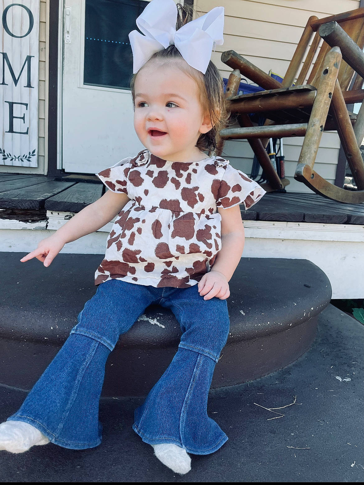 Oakley joined the competition — help win amazing prizes! baby_toddler_clothing, child, costume_hat, denim, electric_blue, eye, fun, happy, hat, human_body, jeans, leg, leisure, pattern, person, sitting, sleeve, smile, t_shirt, toddler