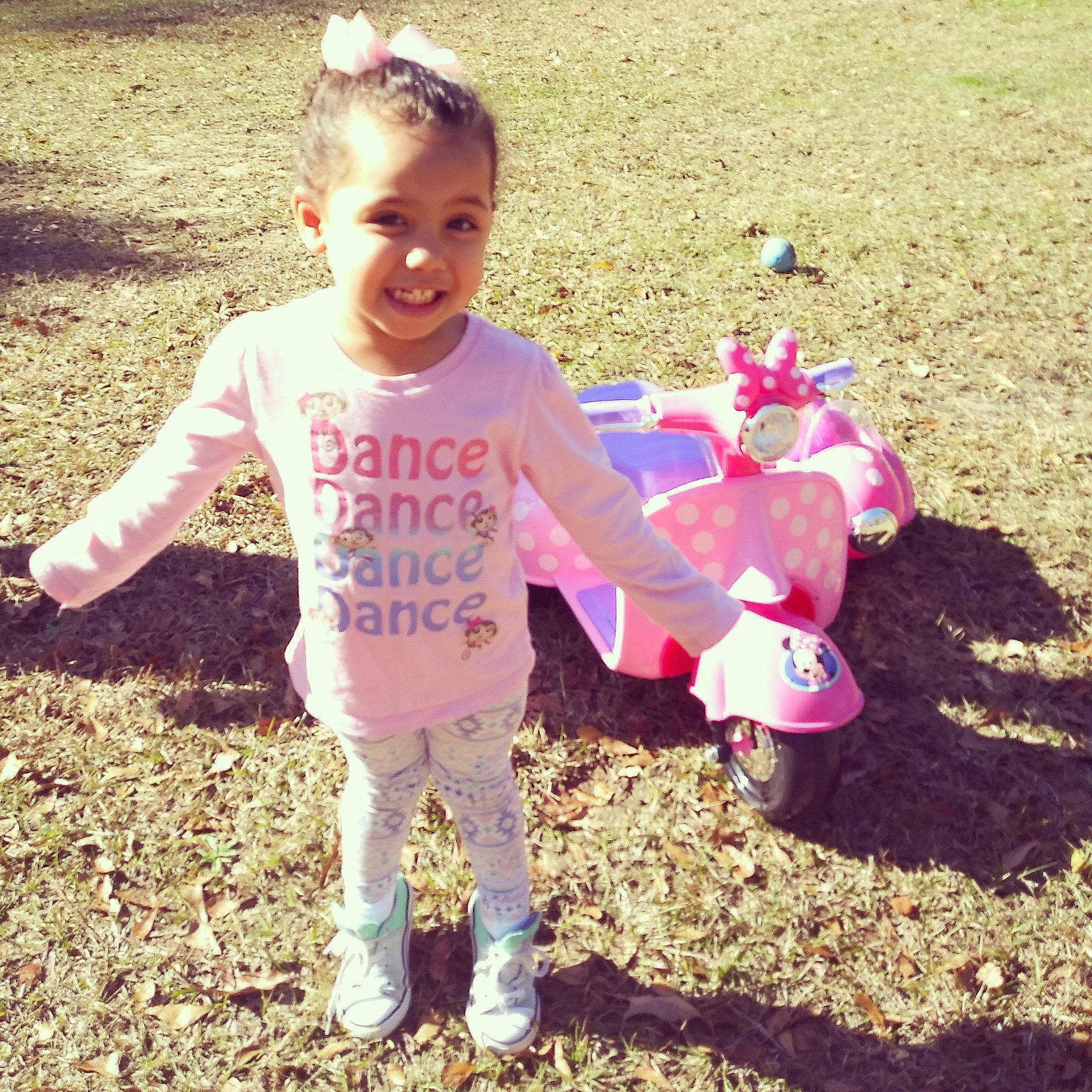 Kenadi is registered to the contest to win money with this photo: adaptation, child, cool, flower, fun, happy, joy, people, person, pink, plant, play, recreation, shoe, sibling, smile, soil, summer, t_shirt, toddler