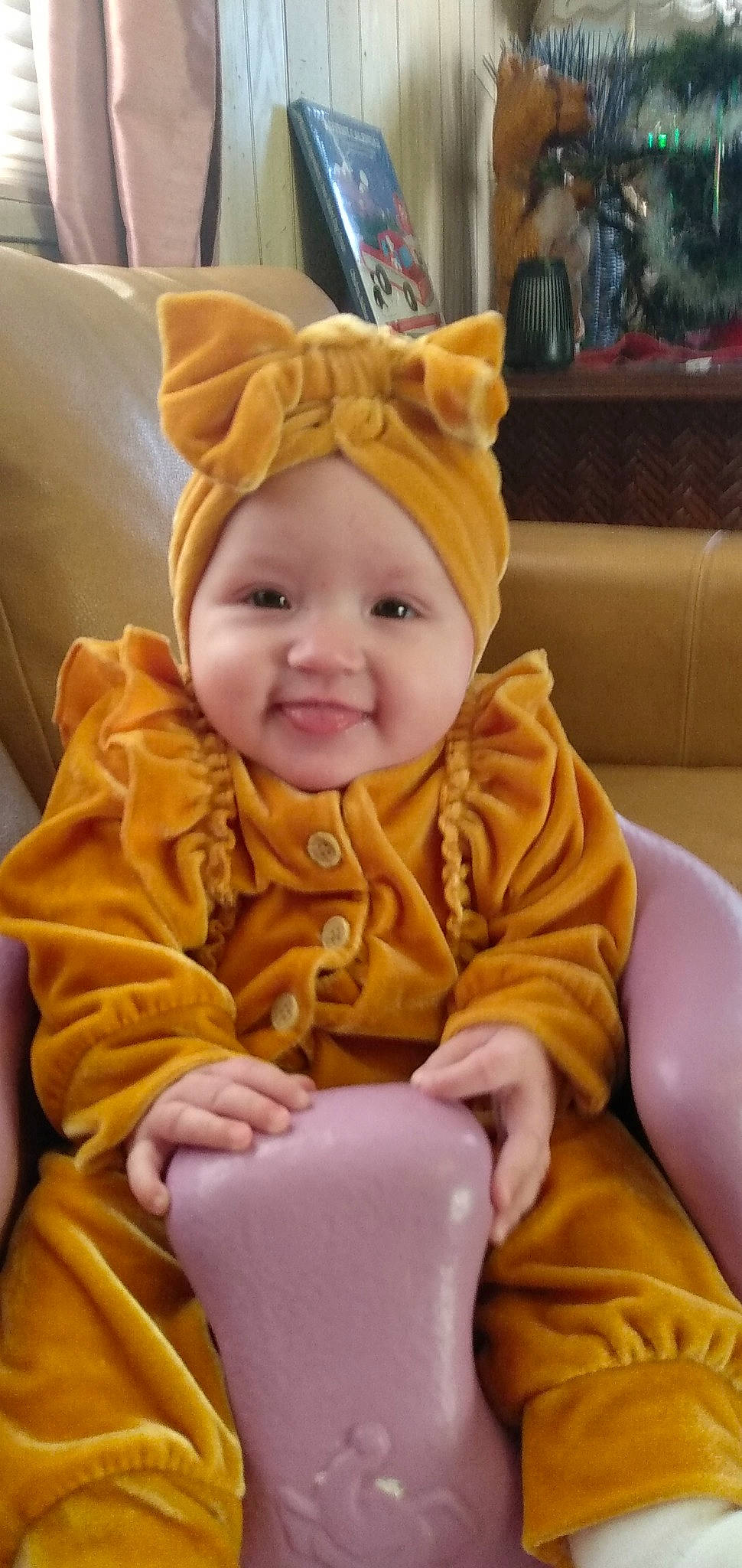 Echo joined the competition — help win amazing prizes! baby, baby_laughing, baby_toddler_clothing, cheek, child, christmas_eve, comfort, couch, event, fun, happy, headwear, joy, lap, laugh, person, room, sitting, skin, sleeve