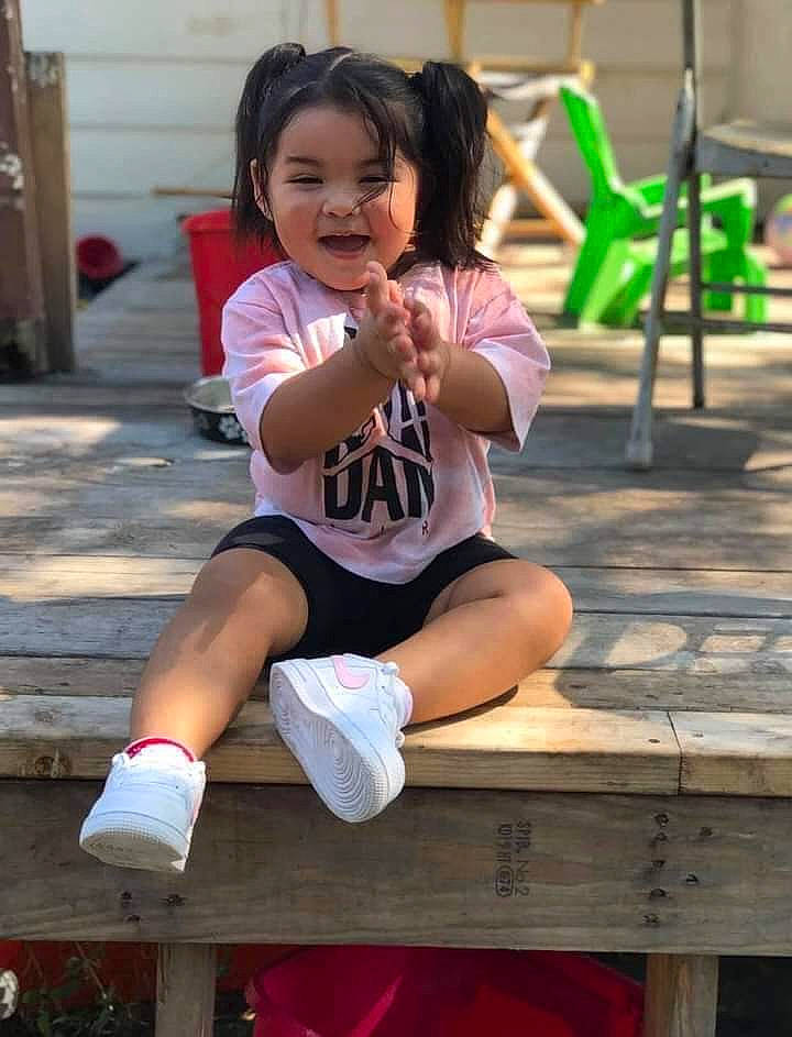 Emrys is registered to the contest to win money with this photo: calf, child, face, footwear, fun, happy, head, joint, knee, leisure, person, recreation, shoe, shorts, sneakers, sock, sportswear, summer, t_shirt, thigh