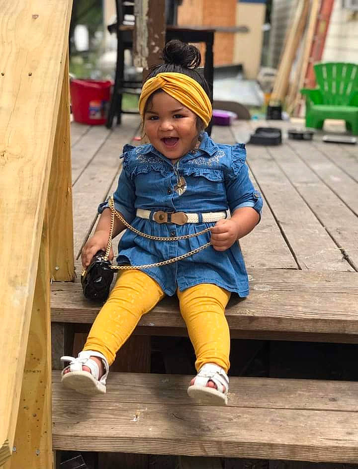 Emrys joined the competition — help win amazing prizes! bag, bench, child, denim, electric_blue, fun, happy, hat, headwear, human_leg, leg, leisure, person, recreation, sitting, smile, street_fashion, thigh, toddler, travel