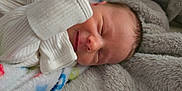 Shawn is registered to the contest to win money with this photo: newborn, baby, sleeping, blanket, cozy, soft, infant, face, peaceful, warm, closeup, child, resting, cute, portrait, skin, head, comfort, toddler, indoors