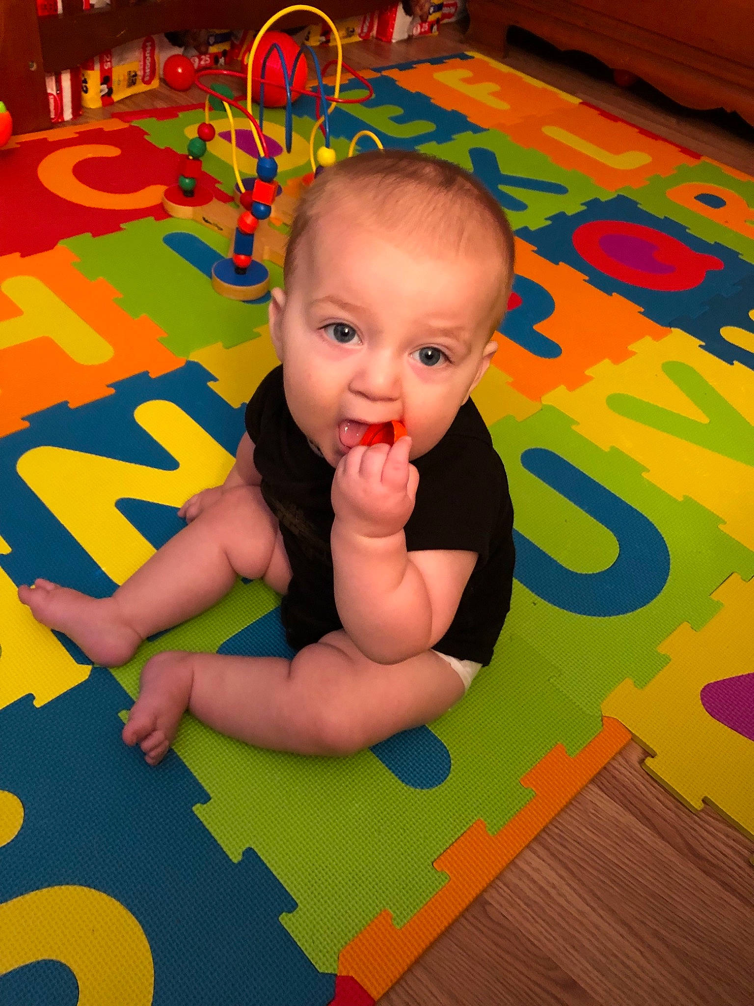 Alistair is registered to the contest to win money with this photo: baby, baby_playing_with_toys, baby_products, baby_toddler_clothing, baby_toys, child, crawling, floor, flooring, fun, head, leisure, person, play, playmat, product, surprise, toddler, toy, tummy_time