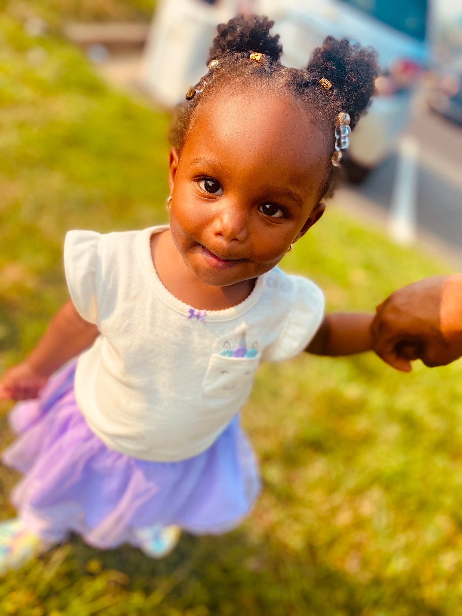 Serenity is registered to the contest to win money with this photo: baby_toddler_clothing, beauty, child, flash_photography, fun, gesture, grass, grassland, happy, headband, jewellery, joy, leisure, meadow, people_in_nature, person, play, recreation, sunlight, t_shirt