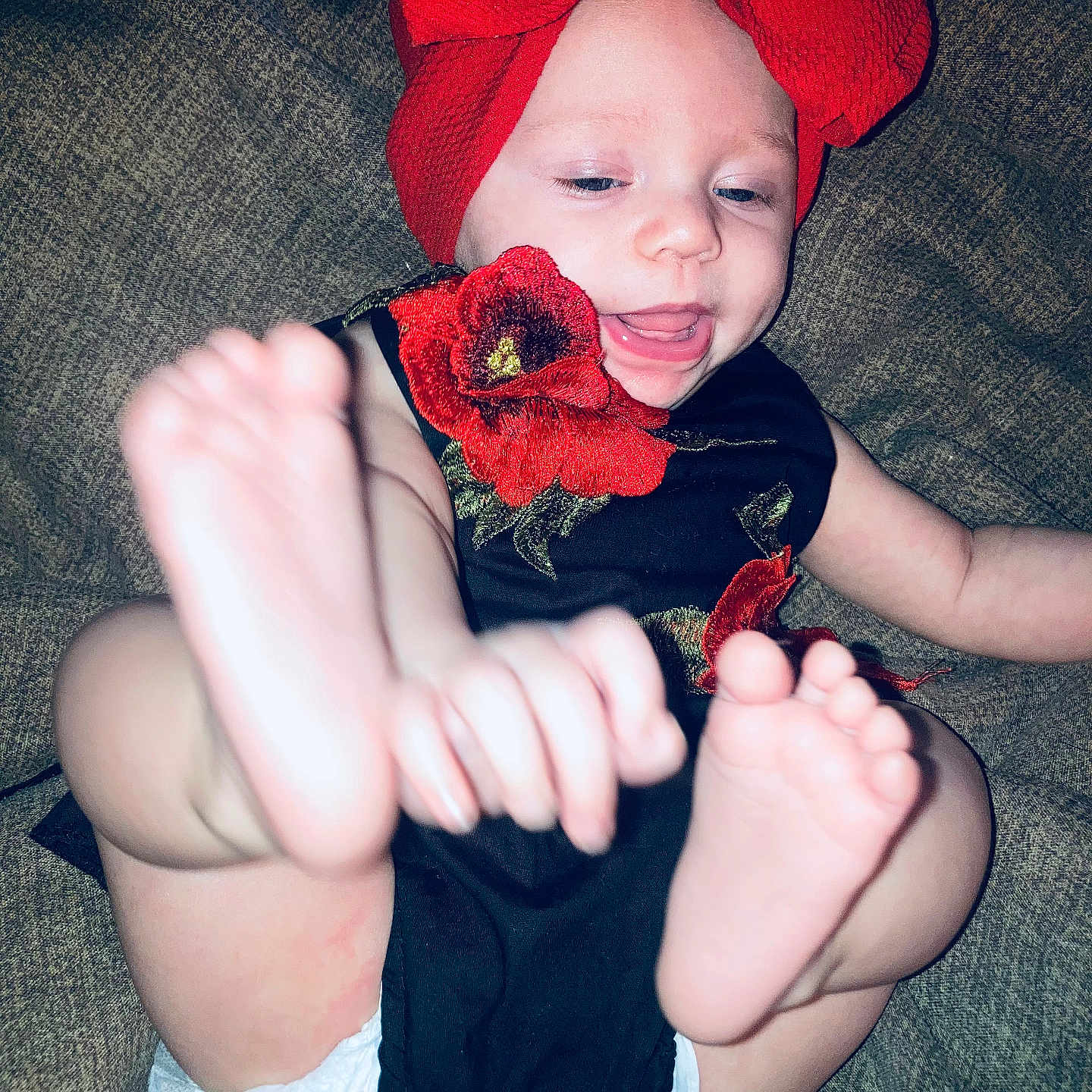 Montana joined the competition — help win amazing prizes! baby, baseballcap, bodypart, cap, clothing, couch, dress, face, finger, furniture, hand, happy, hat, head, laughing, pants, person, photography, portrait, shorts