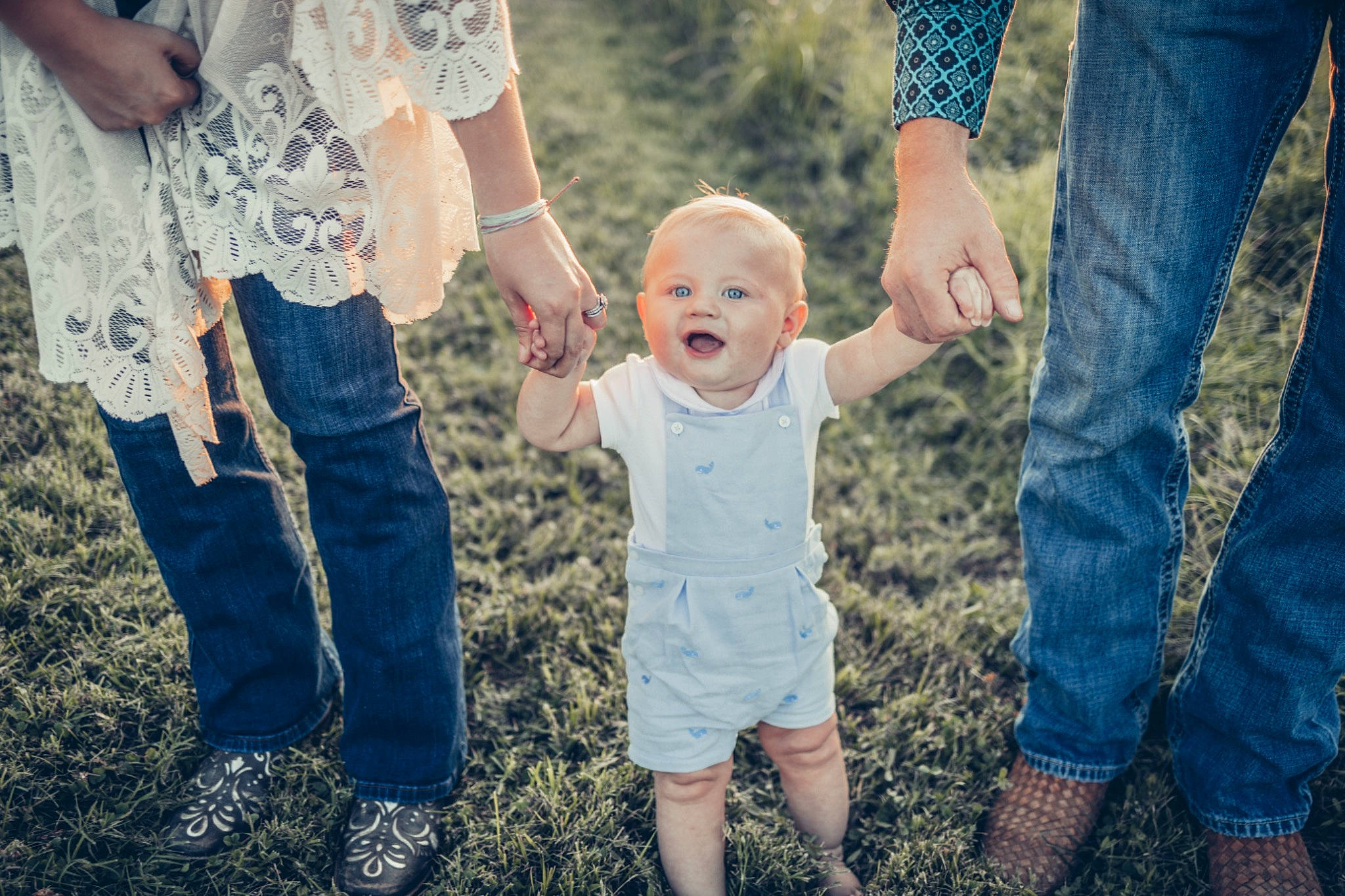 Ford is registered to the contest to win money with this photo: clothing, facial_expression, flash_photography, fun, gesture, grass, hand, happy, holding_hands, human_body, jeans, leaf, morning, nature, people_in_nature, person, plant, sky, standing, sunlight