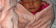 Ilona participe au concours pour gagner de l'argent avec cette photo : newborn, baby, blanket, pink, sleeping, wrapped, cozy, infant, soft, bed, bedding, peaceful, cute, face, person, child, resting, warm, toddler, indoors