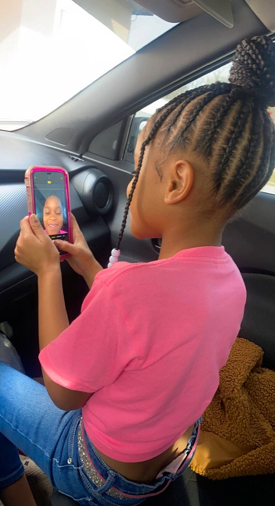 Azaria is registered to the contest to win money with this photo: auto_part, automotive_design, automotive_exterior, automotive_mirror, beauty, black_hair, child, cool, cornrows, dreadlocks, gesture, jeans, joy, long_hair, mobile_phone, mode_of_transport, motor_vehicle, person, steering_wheel, t_shirt