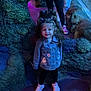 Bellarose is registered to the contest to win money with this photo: child, girl, denim_jacket, pigtails, smile, reflection, mirror, rock_wall, texture, indoor, casual_clothing, sneakers, blue_light, purple_light, person, standing, tattoos, jeans, legs, happy