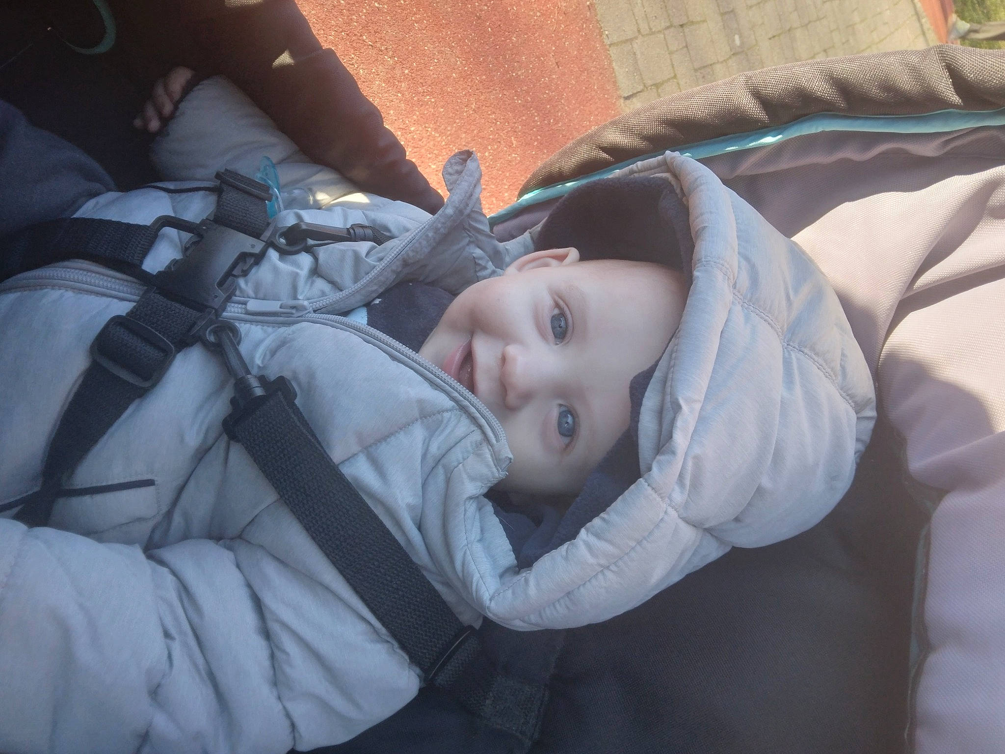 Emmanuel participe au concours pour gagner de l'argent avec cette photo : baby, baby_carriage, baby_products, child, comfort, darkness, electric_blue, eye, flash_photography, fun, grass, head, headwear, human_body, nap, person, sitting, sleep, smile, toddler