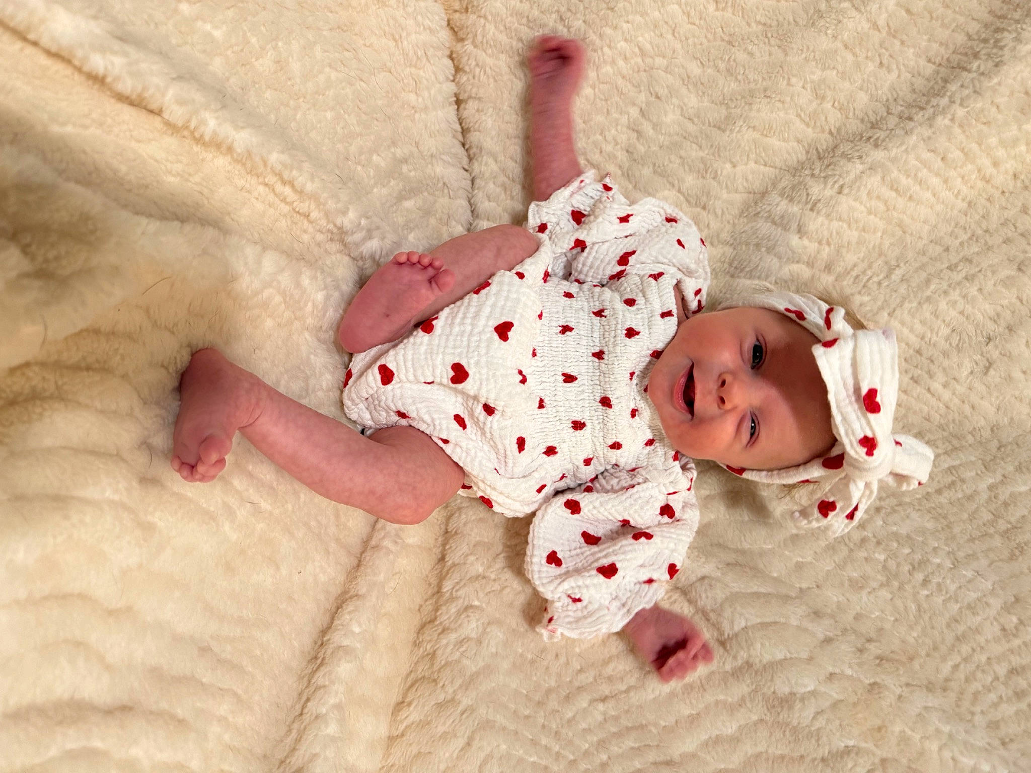 Oaklee joined the competition — help win amazing prizes! arm, baby, baby_sleeping, baby_toddler_clothing, carmine, child, comfort, face, finger, flooring, foot, head, headwear, human_body, leg, linens, pattern, person, sleeve, textile