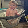 Brynleigh joined the competition — help win amazing prizes! baby, child, smiling, indoor, chair, furniture, television, colorful, happy, person, skin, hair, face, baby_chair, wood_floor, home, living_room, seat, polka_dot, mesh