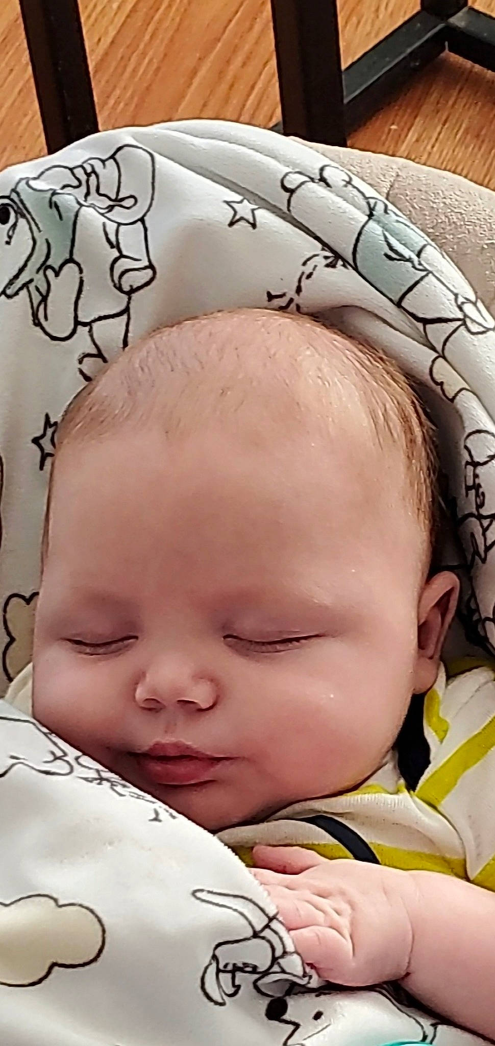 Flynn is registered to the contest to win money with this photo: baby, baby_toddler_clothing, cheek, chin, comfort, ear, eye, eyebrow, eyelash, finger, forehead, head, iris, lip, mouth, nose, organ, person, skin, textile